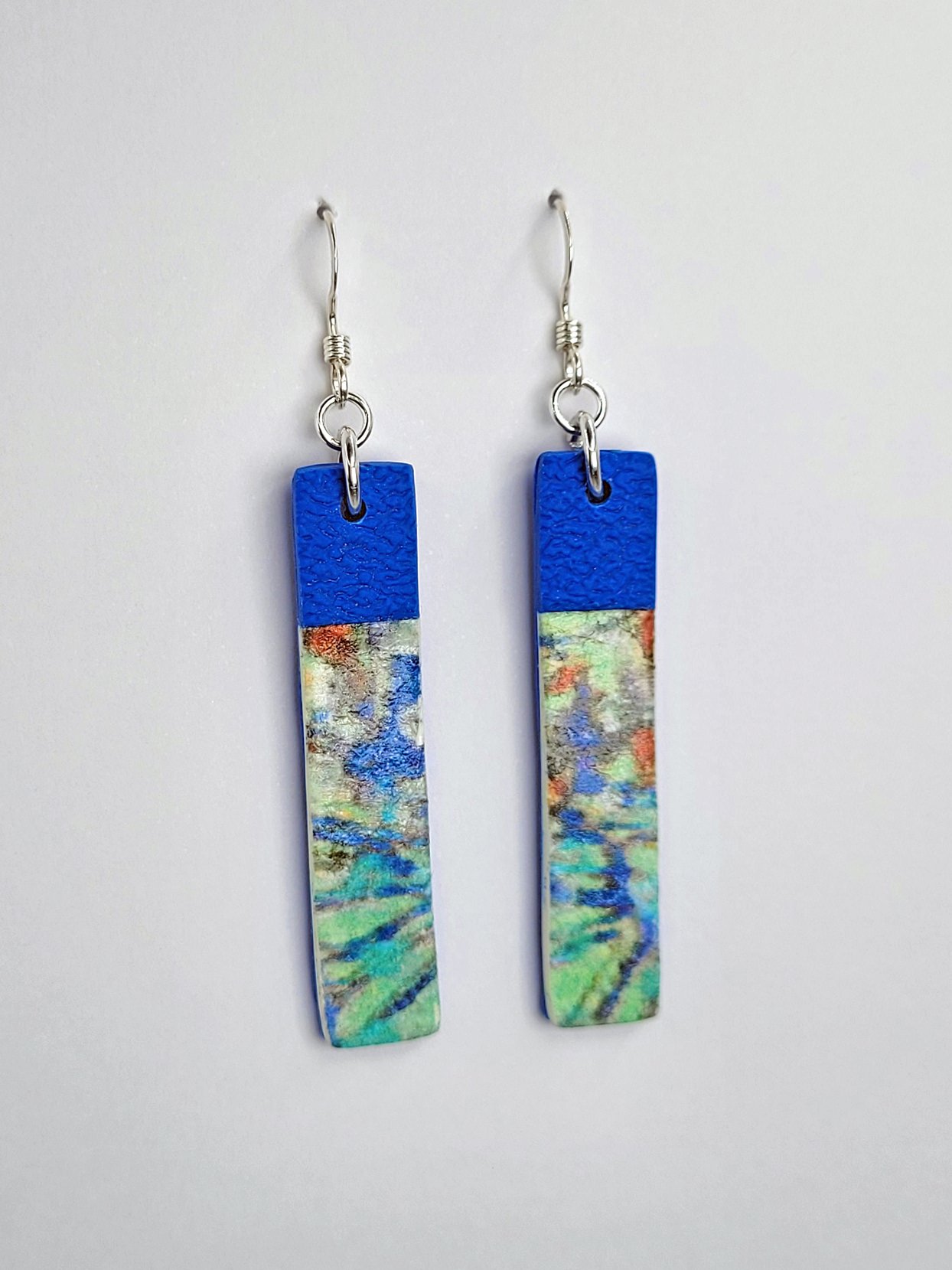 Sprig Blue Cane Earrings left face 1.jpg