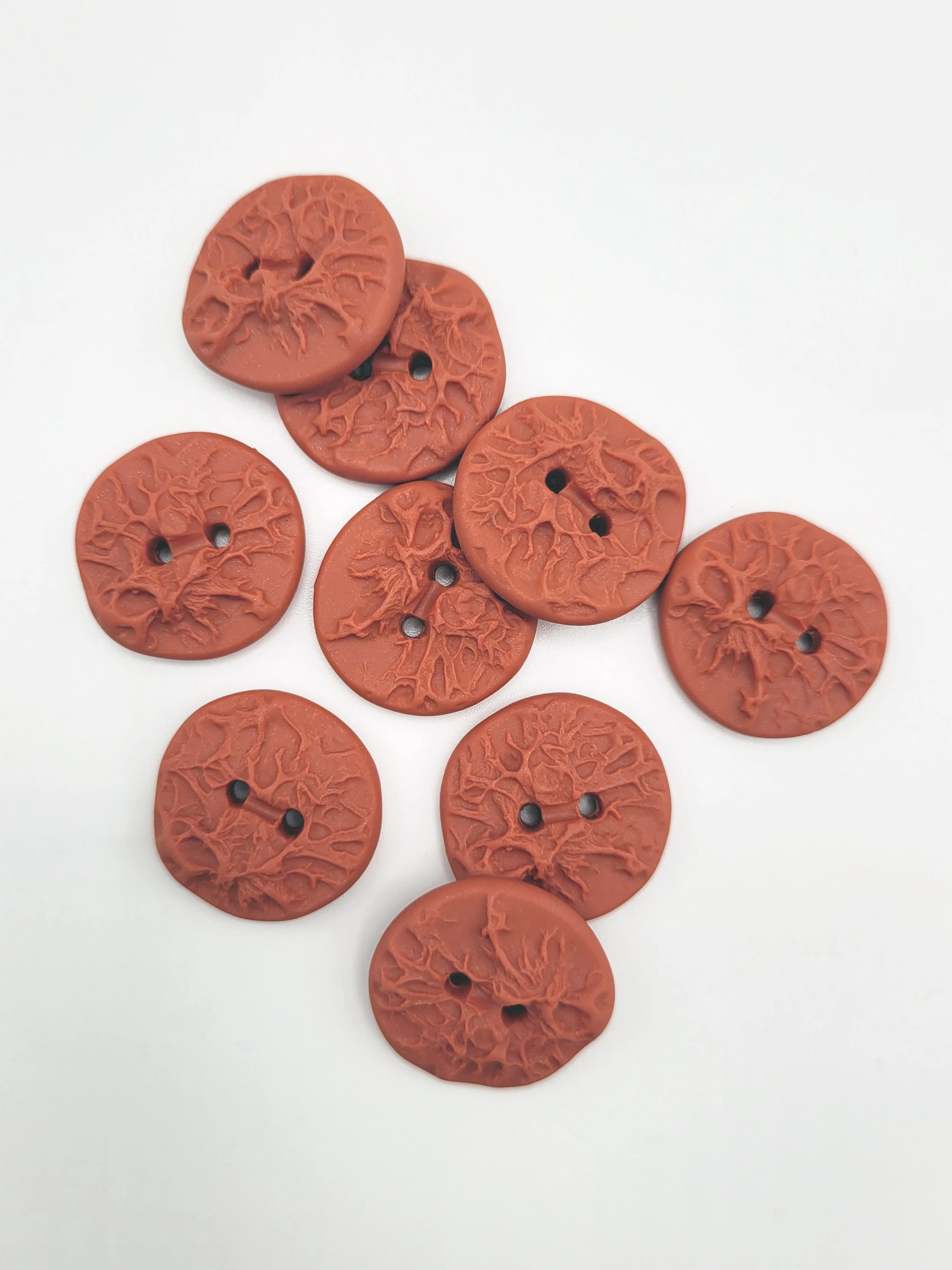Pink terracotta lichen buttons.jpg