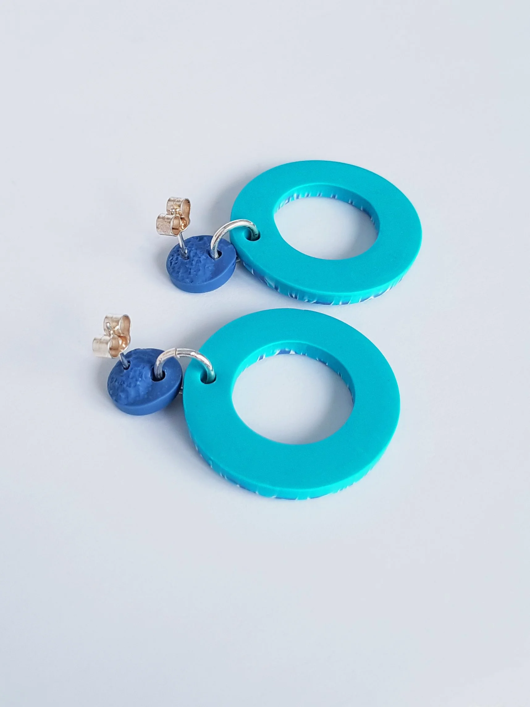 Light and mid blue abstract hoop polymer clay earring posts and scrolls.jpg