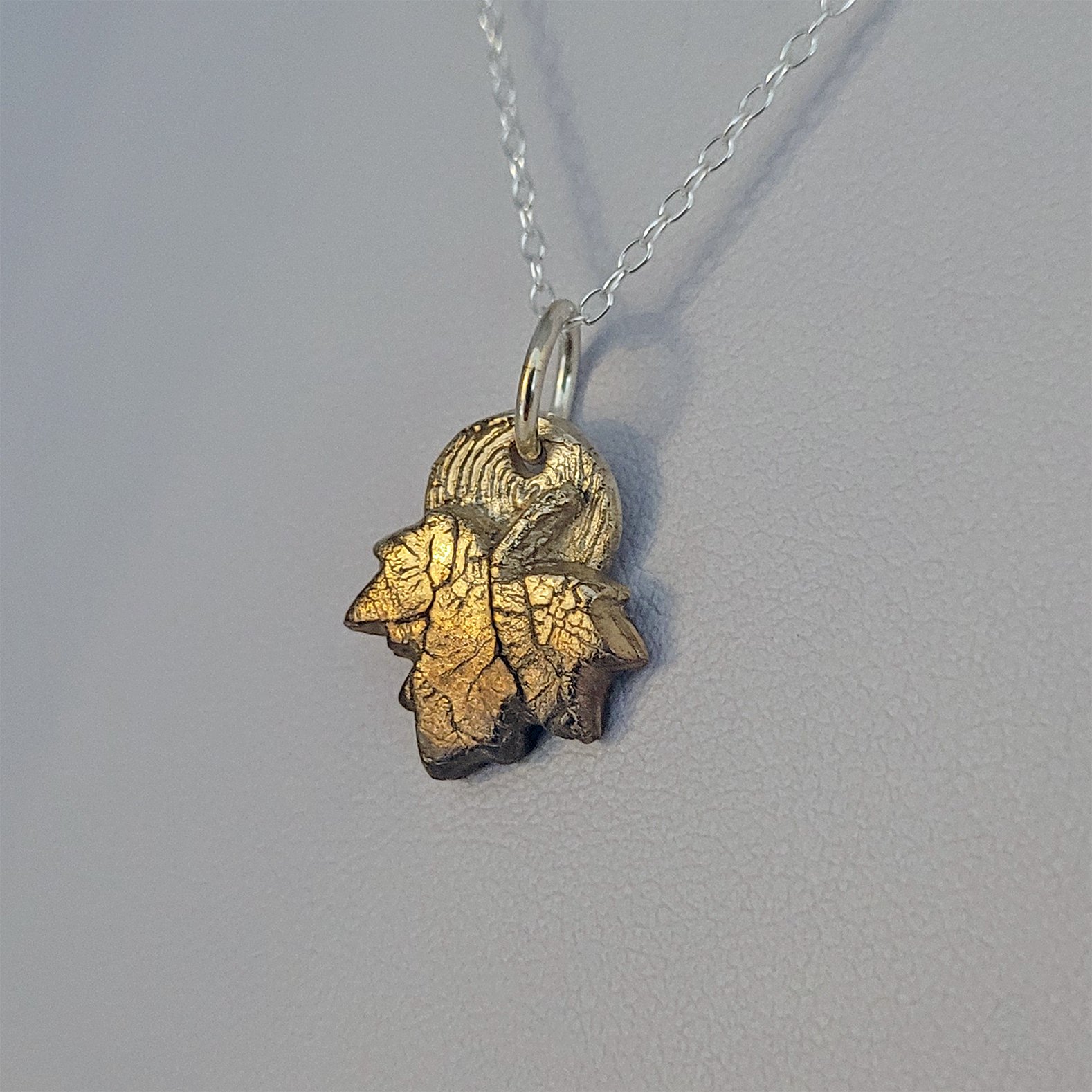 A leaf pendant with graduated colour created with liver of sulphur by Carmel on a Silver Clay Jewellery for Beginners workshop.