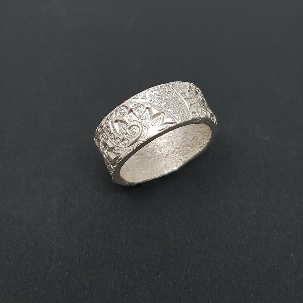 A textured ring made by Maya on the Silver Ring workshop.