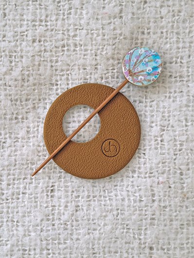 The back of Sprig Ginger Shawl Pin is a lightly textured warm ginger brown stamped with my makers mark.