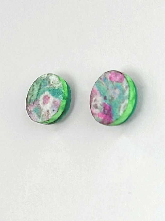 Round, flat studs in green pink and white with imperfect edges accentuating their hand crafted origins.