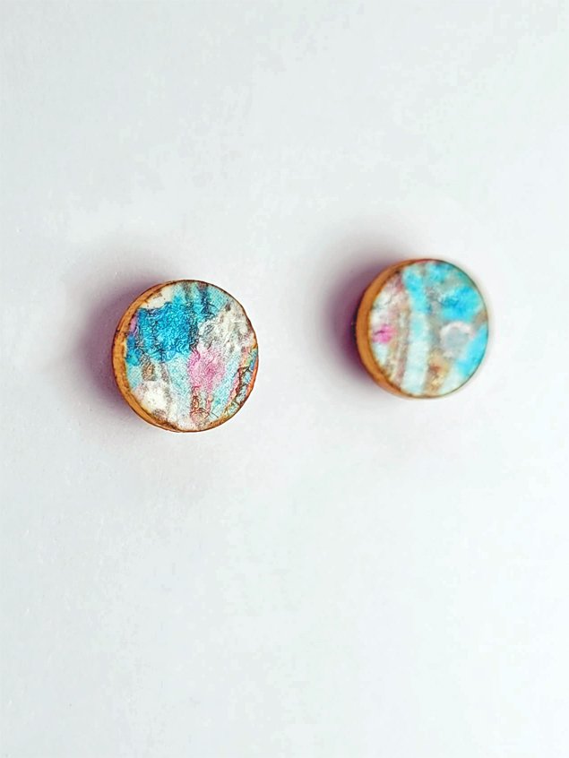 Stud earrings with subtle turquoise, pink, white and copper brown faces and irregular ginger brown edges.
