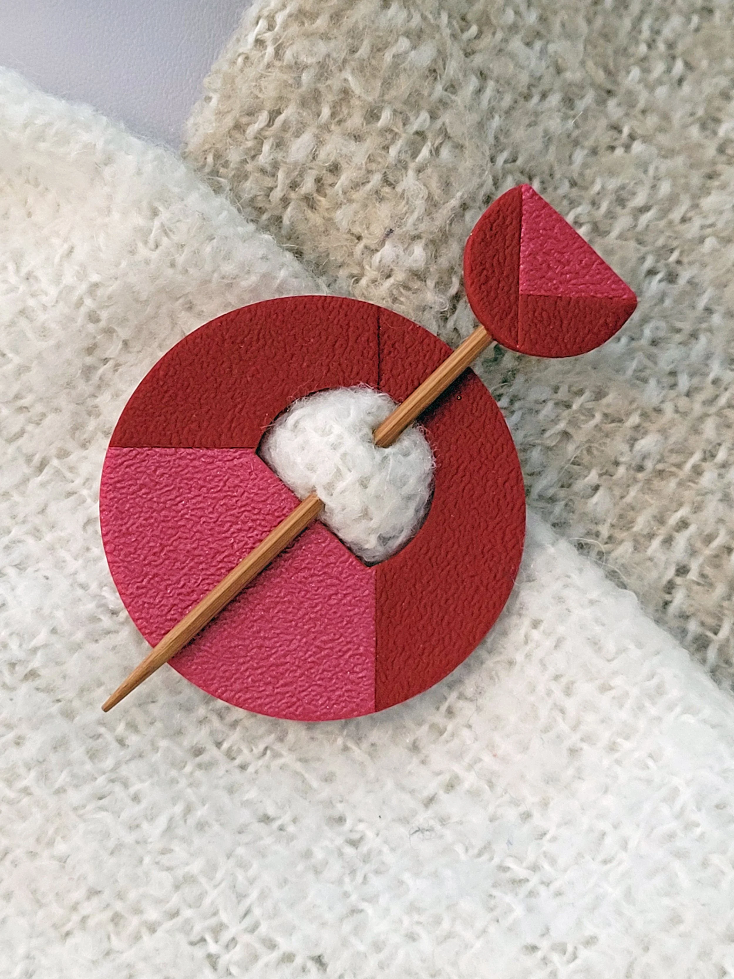 A Wine Two Tone pin used on a shawl.