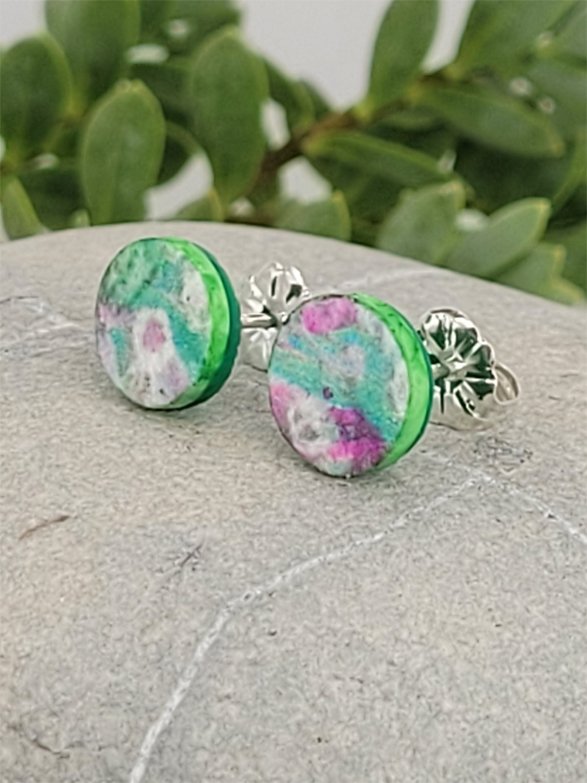 Pastel green and pink studs with leaf green edges and backs and sterling silver posts and scrolls.