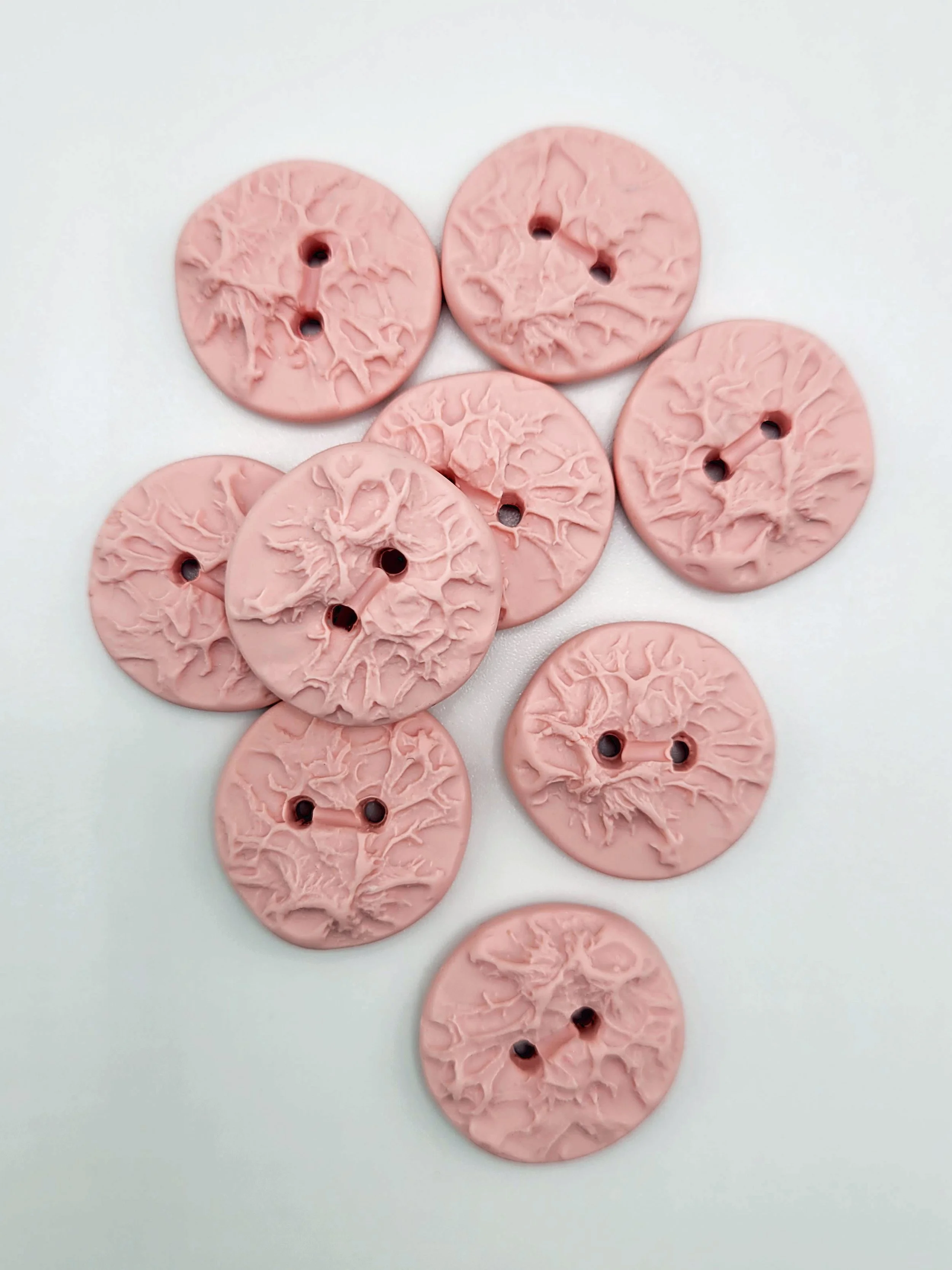 Baby pink lichen buttons.jpg