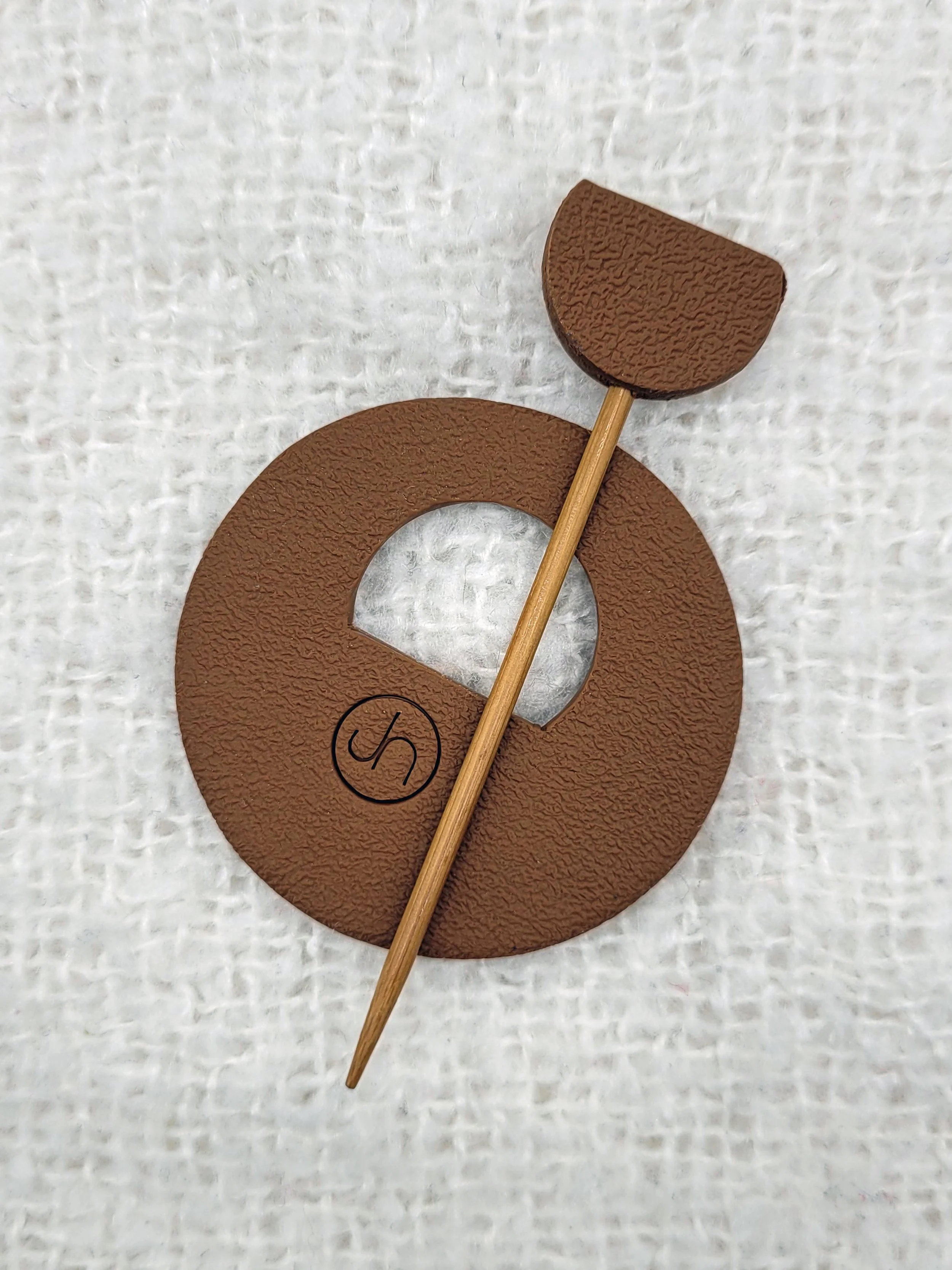 The back of the Hazelnut Two Tone pin is lightly textured and carries my maker's mark.