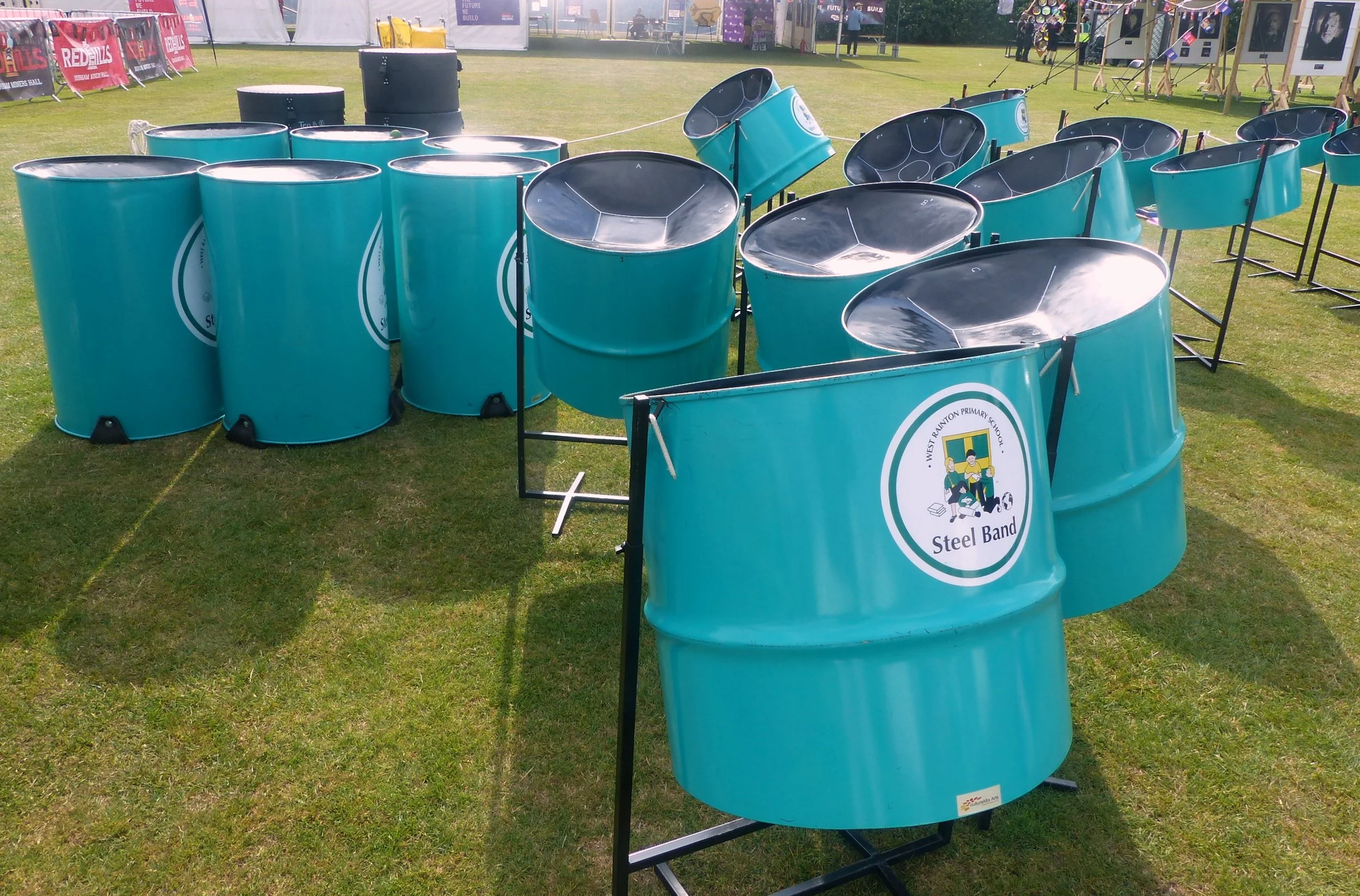 Steel pans on the grass waiting for the start of the Miners' Gala