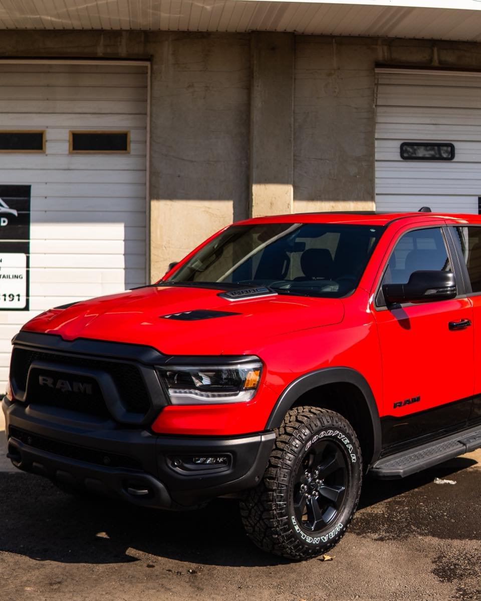 Ram 1500 Received our premium interior and exterior detail + hand wax add on making this paint POP!! 

We also installed front window tint to match the rears, this not only changes the appearance of your vehicle. It also protects your interior from f