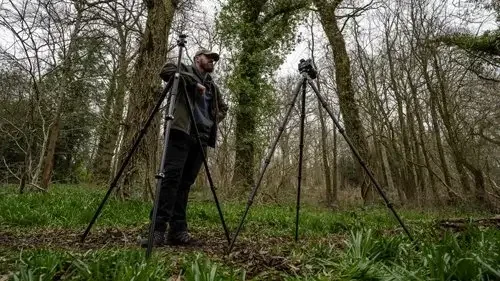 Chris Homer with two tripods, the Benro Tortoise 35C and a Manfrotto 055