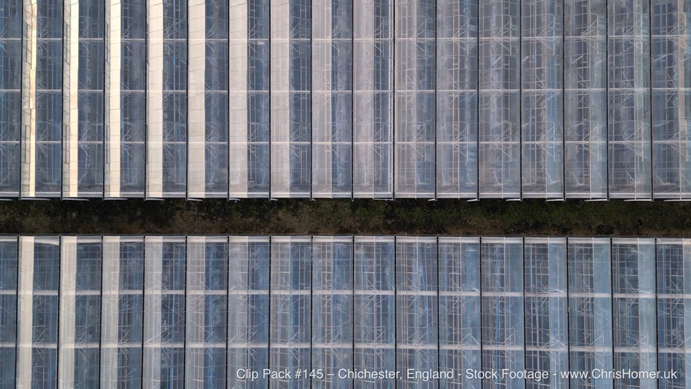 Huge industrial greenhouse drone stock footage