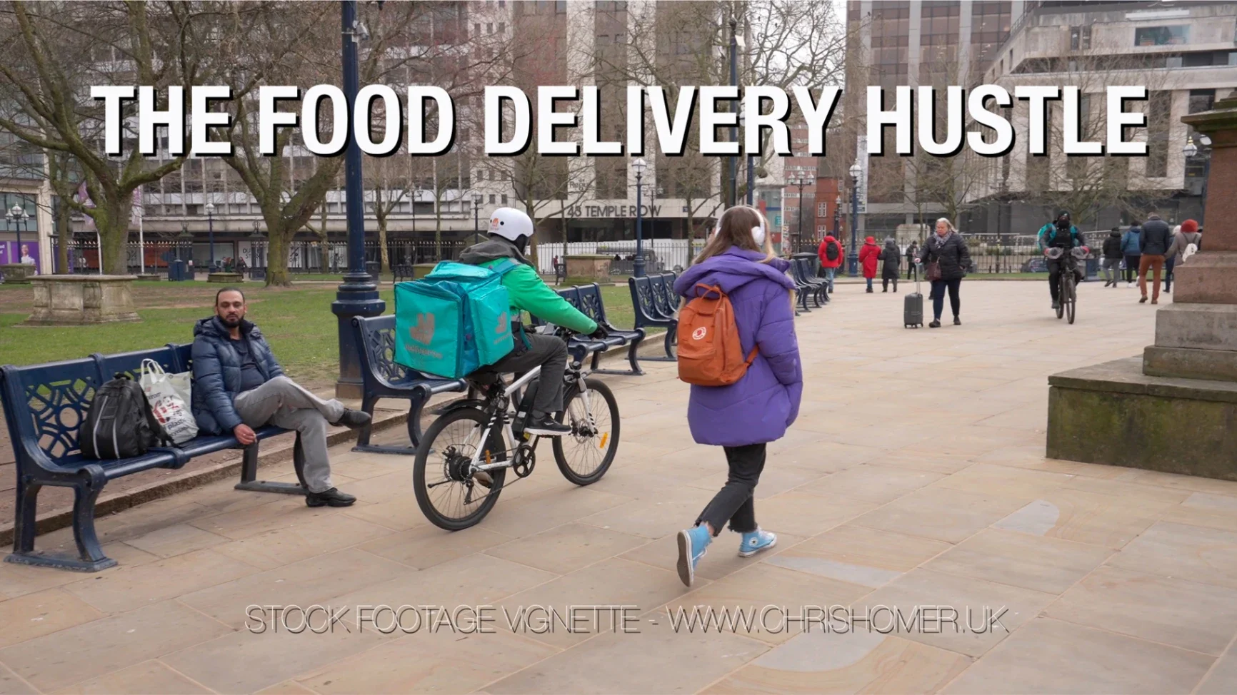 A Deliveroo rider delivering food, stock video footage, no extra fees for 4K