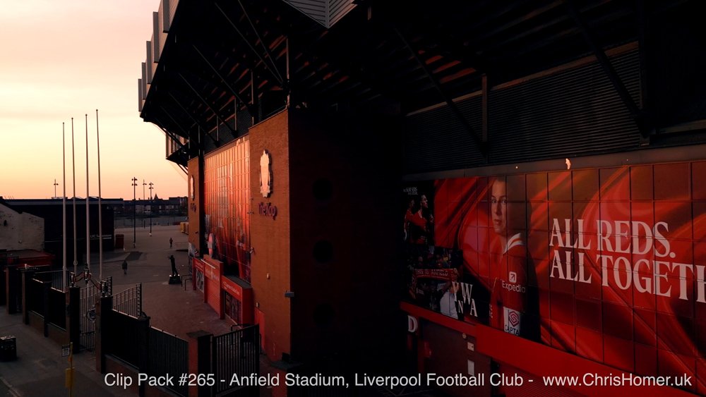Liverpool Badge: Close-ups of the iconic Liverpool FC badge on the stands.