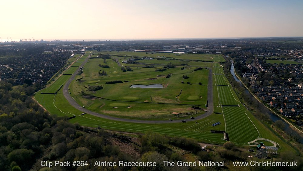 Welcome to Aintree: A stunning reveal of the "Welcome to Aintree Racecourse" sign, the gateway to this historic venue