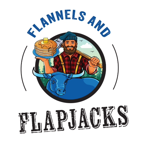 Logo for Flannel and Flapjacks featuring a man with a beard, wearing a flannel shirt and blue beanie, holding a stack of flapjacks and a paddle, with a blue buffalo and mountains in the background.