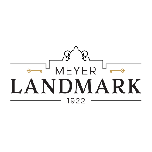 A logo with the text "Meyer Landmark 1922" and decorative elements, including two small gold keys.