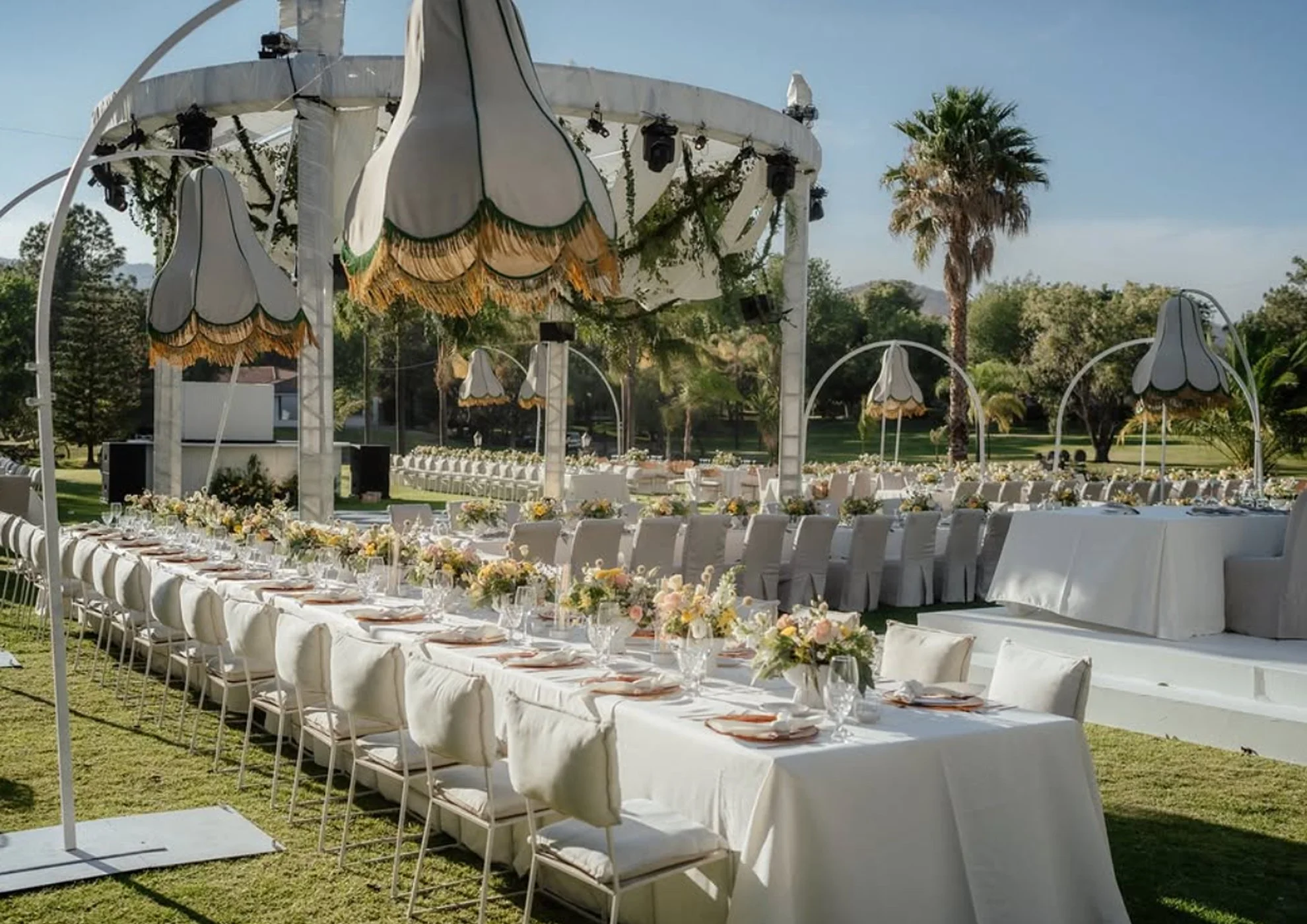 Hacienda Benazuza reception with elegant tables, white linens, and floral centerpieces at a luxury wedding venue in Jalisco, Mexico