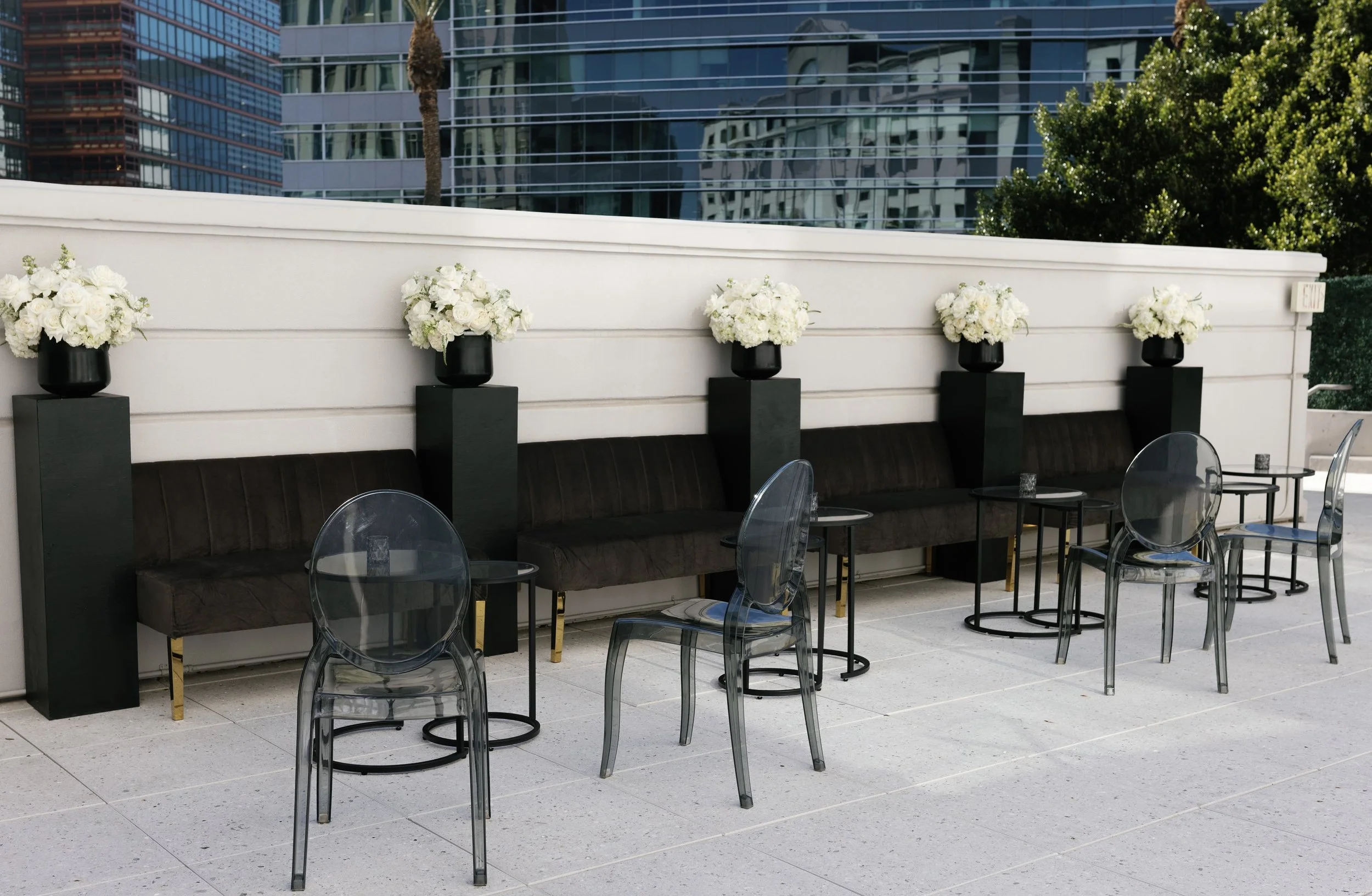 Modern rooftop wedding reception at The Camby in Scottsdale, Arizona featuring a black and white aesthetic, elevated contemporary design, and a stylish outdoor celebration atmosphere.