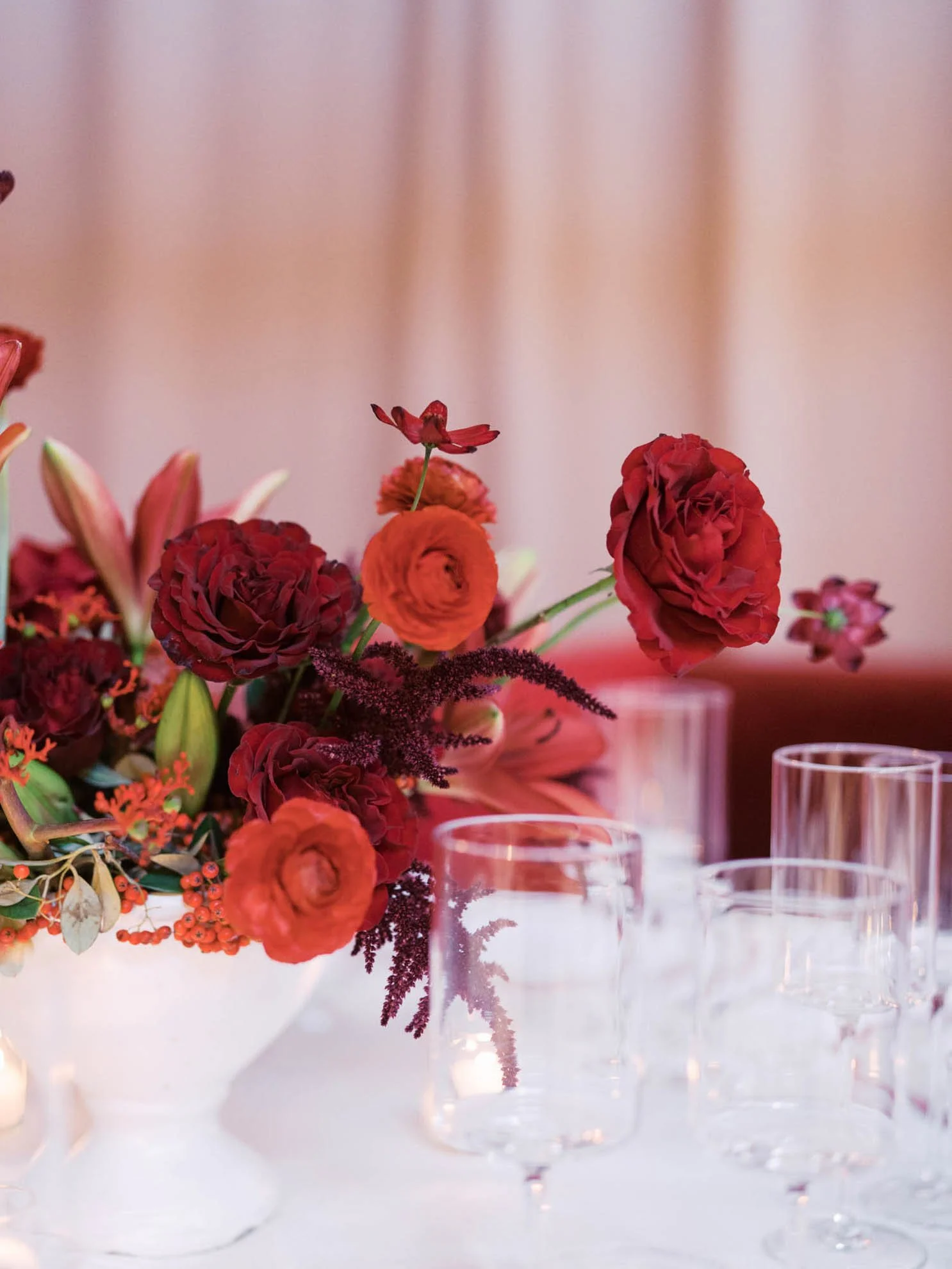 26 tabletop-with-red-flowers-and-glasses.jpg