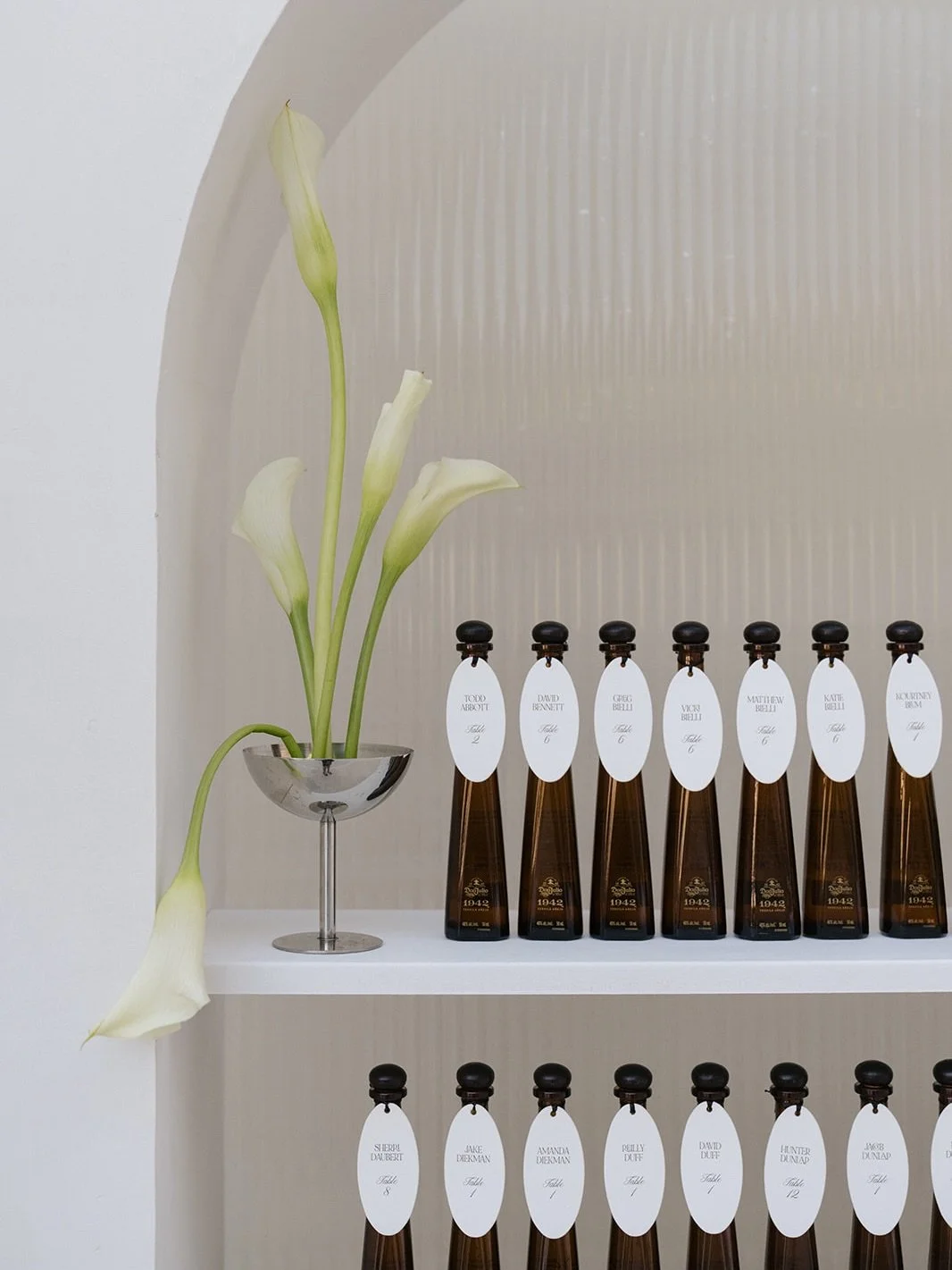 What if your wedding team cared just as much at 1:30am the night before your wedding as they did when you first said yes?

160+ escort cards.
Each one reworked by hand.

When our original attachment method didn&rsquo;t meet our standards, four member