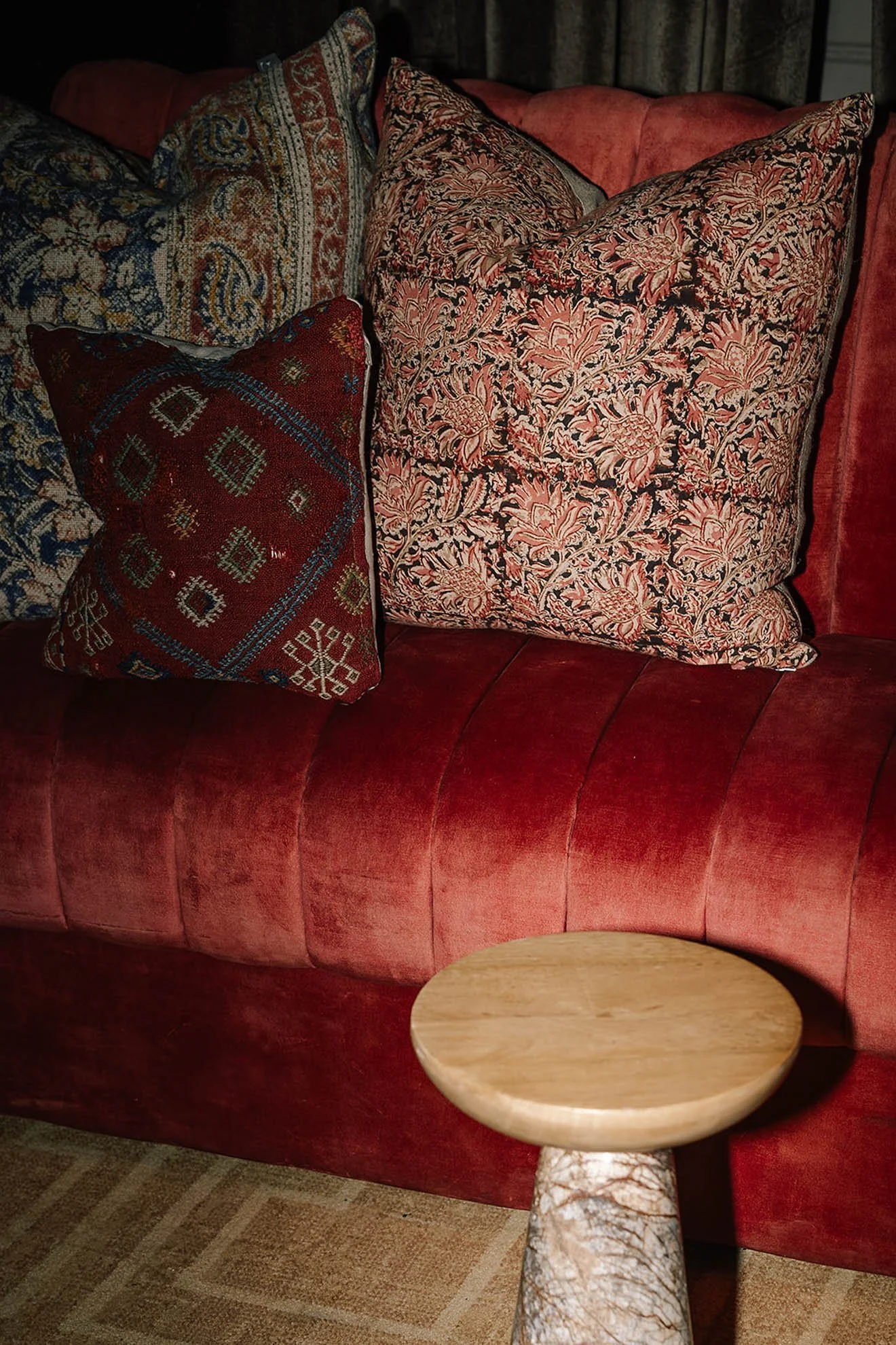 34moody-lounge-red-sofa-stone-table.jpg