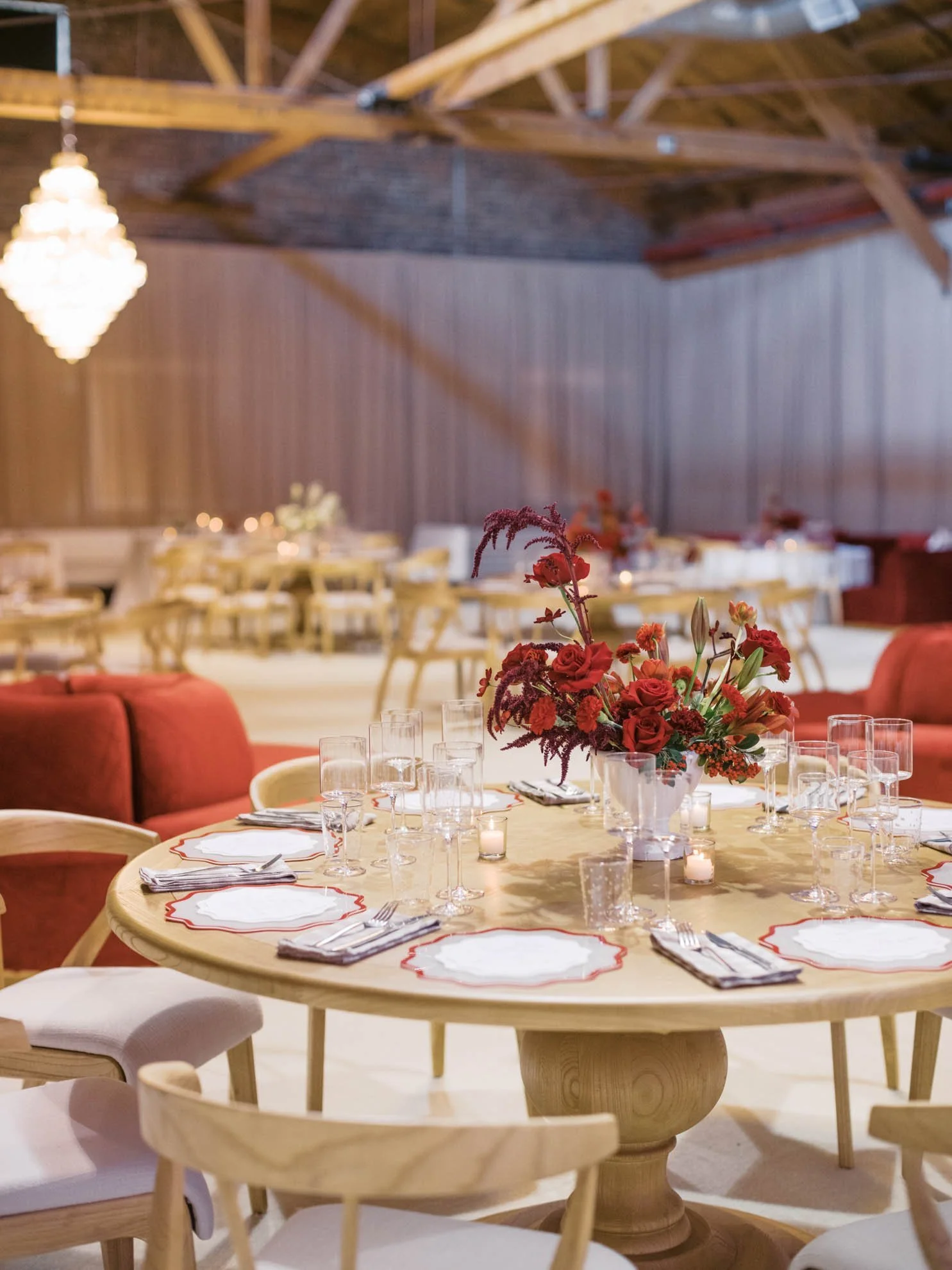 27wooden-table-red-floral-styling.jpg