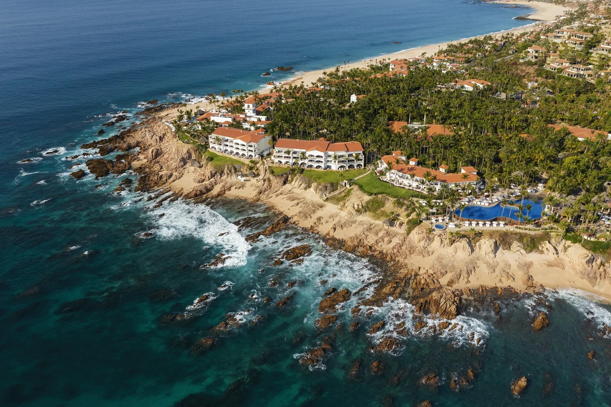 One&Only Palmilla luxury wedding venue with traditional architecture, oceanfront views, and manicured grounds in Los Cabos, Mexico