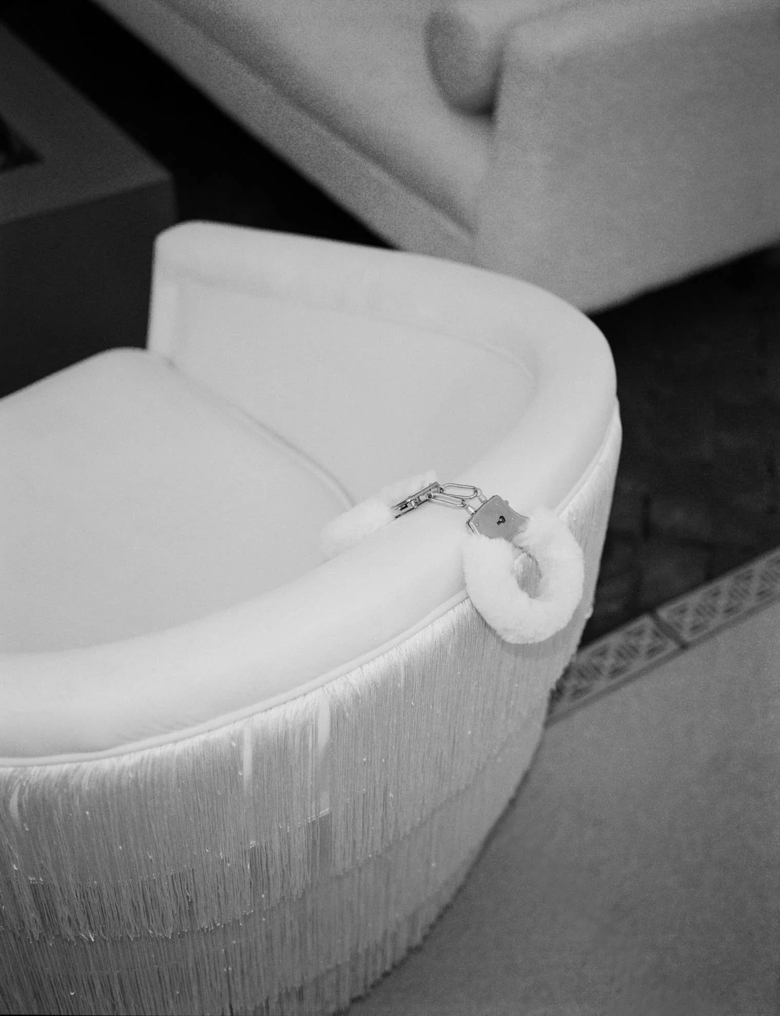 31fuzzy-handcuffs-on-tasseled-chair-couples-shower.jpg