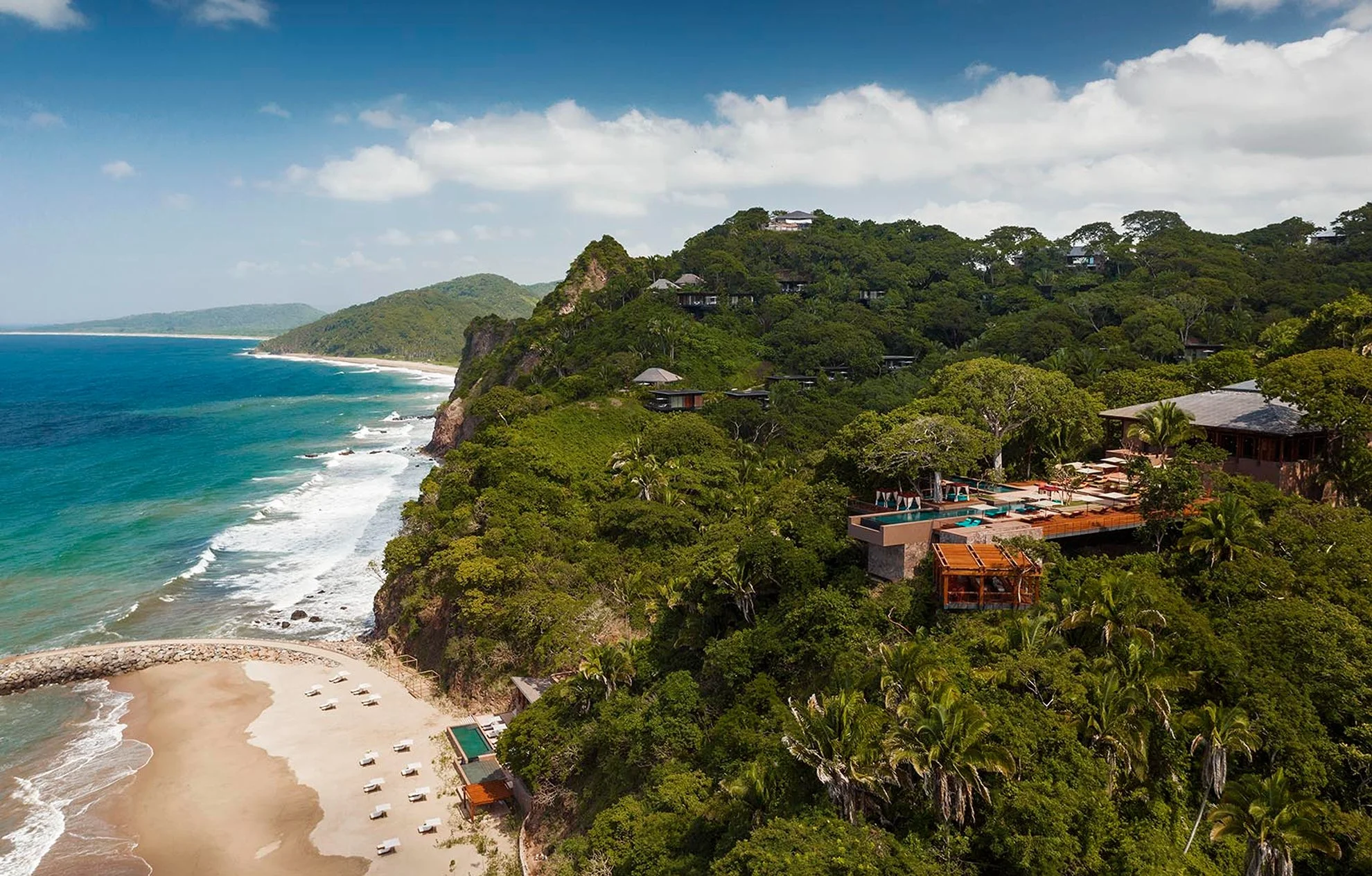 Aerial view of One&Only Mandarina luxury wedding venue with beachfront, ocean views, and lush forest in Riviera Nayarit, Mexico