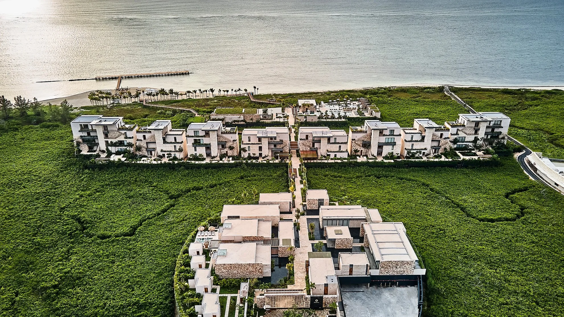 Étéreo Auberge Resorts luxury wedding venue with ocean views, modern design, and lush forest in Puerto Morelos, Mexico