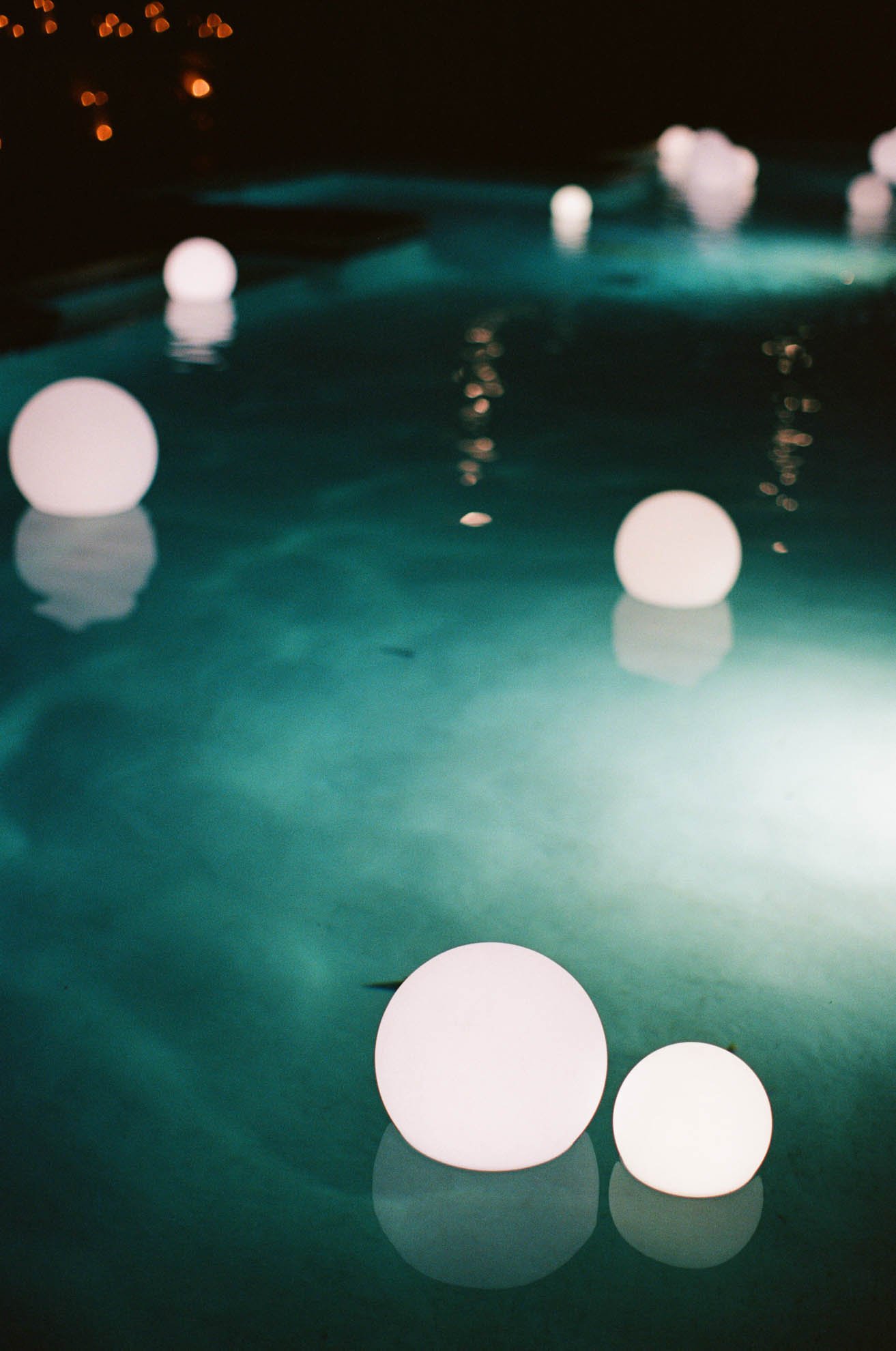28floating-orbs-poolside-wedding-event.jpg