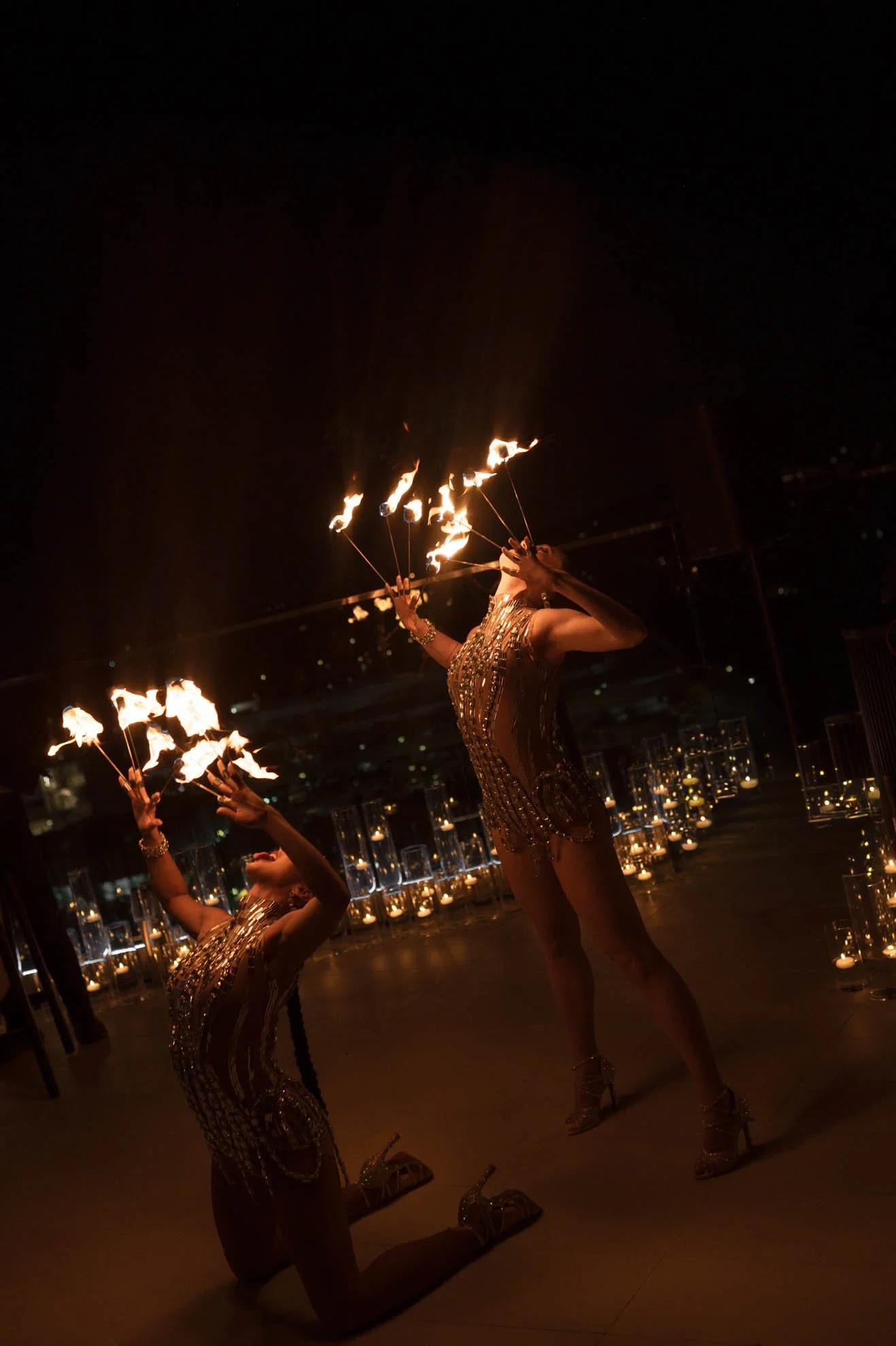 21fire-dancers-rooftop-destination-wedding-welcome-party.jpg
