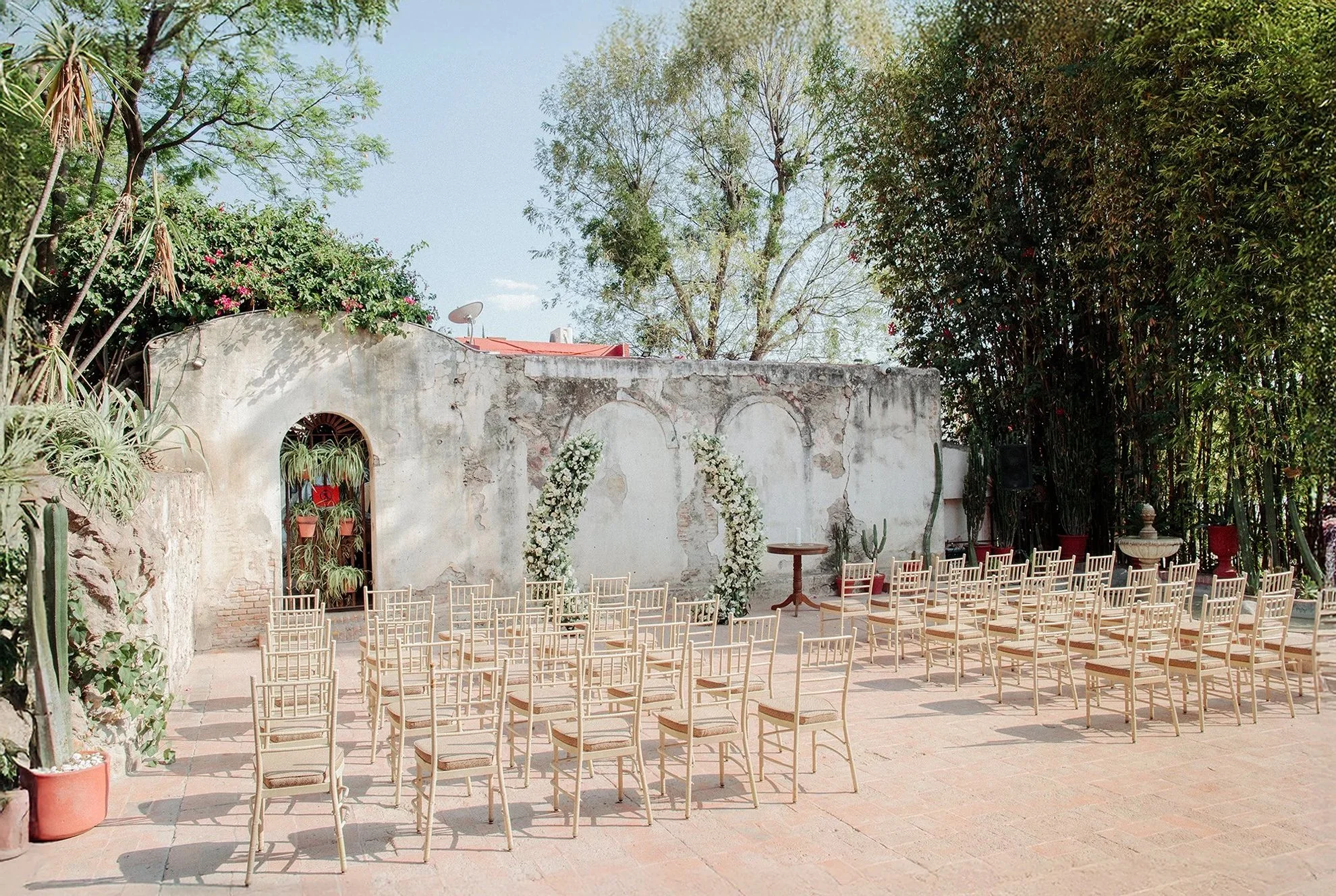 Intimate Mexico destination wedding ceremony at Belmond Casa de Sierra Nevada with historic architecture in San Miguel de Allende