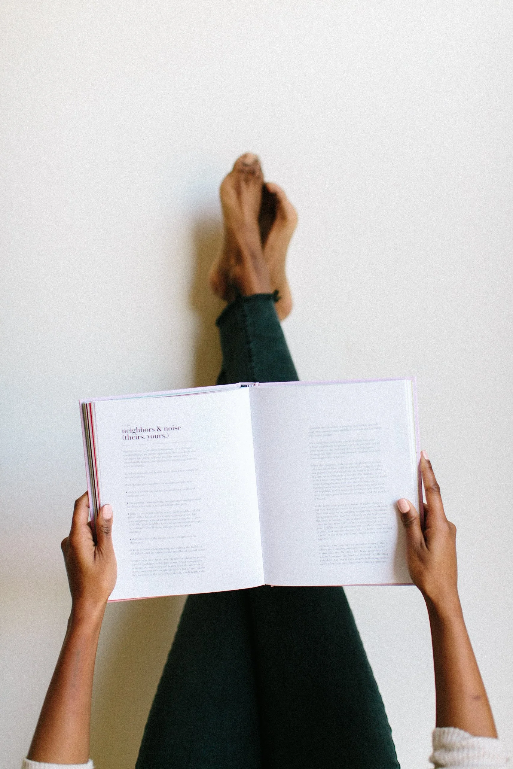 A Millenial Women Reading a Book