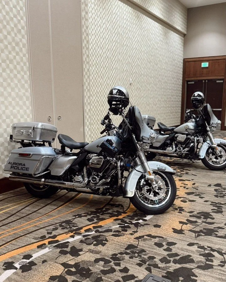 Just your typical Friday night with motorcycles, medals, and keeping things running smoothly behind the scenes. 💙🏍️