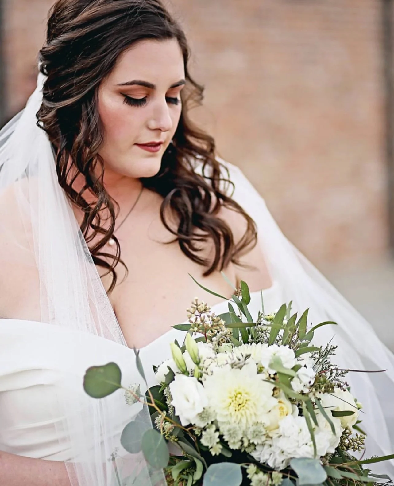 Bride on her wedding day with professional hair and makeup