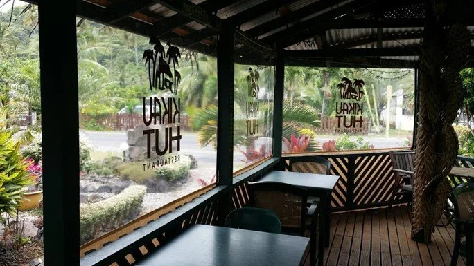  Kikau Hut Restaurant on Rarotonga with advertising on windows