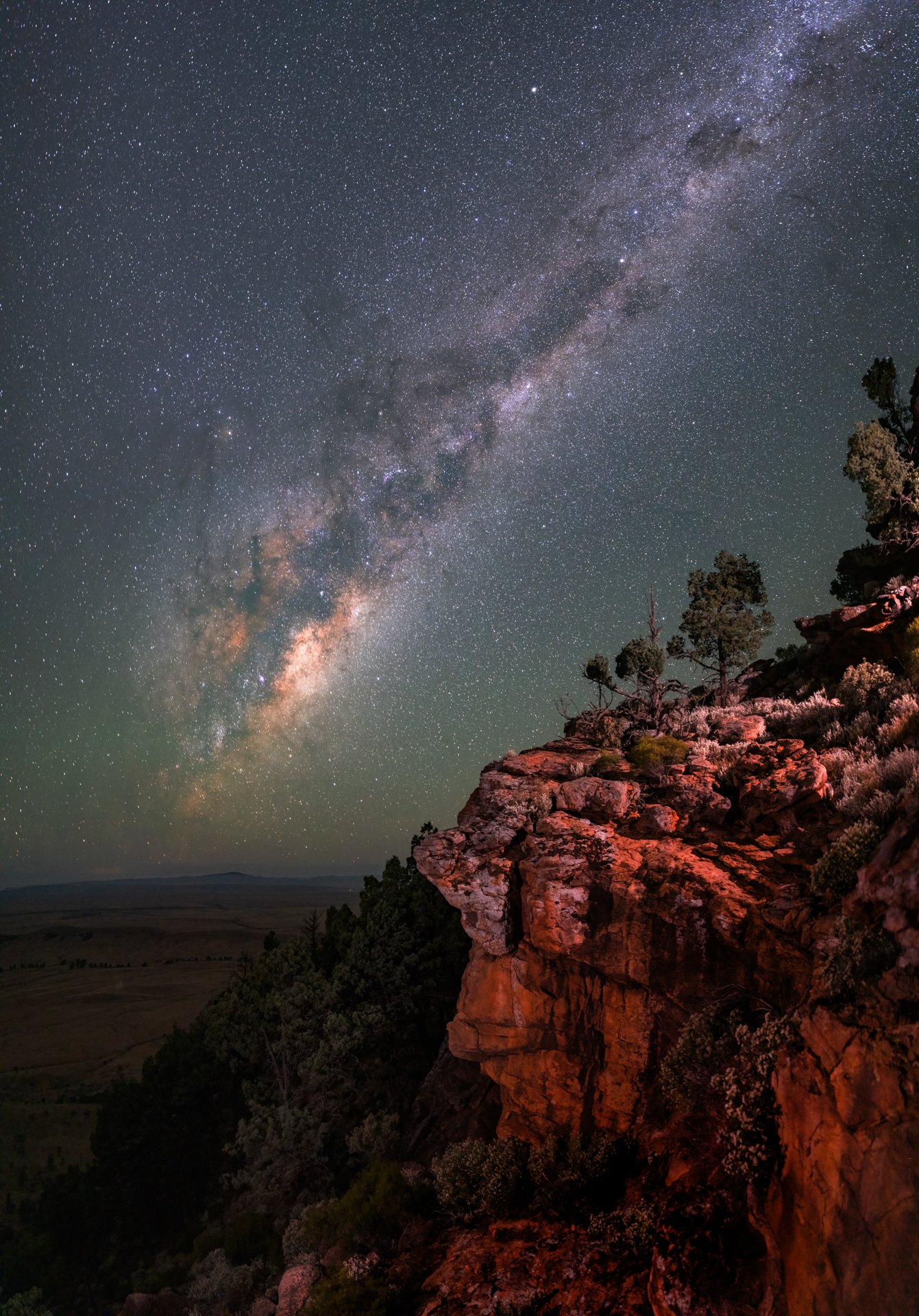 Click to see full image - This is a 3 shot vertical panorama. But each image is a single exposure. Small lights to the left and right of frame are lighting the foreground. 