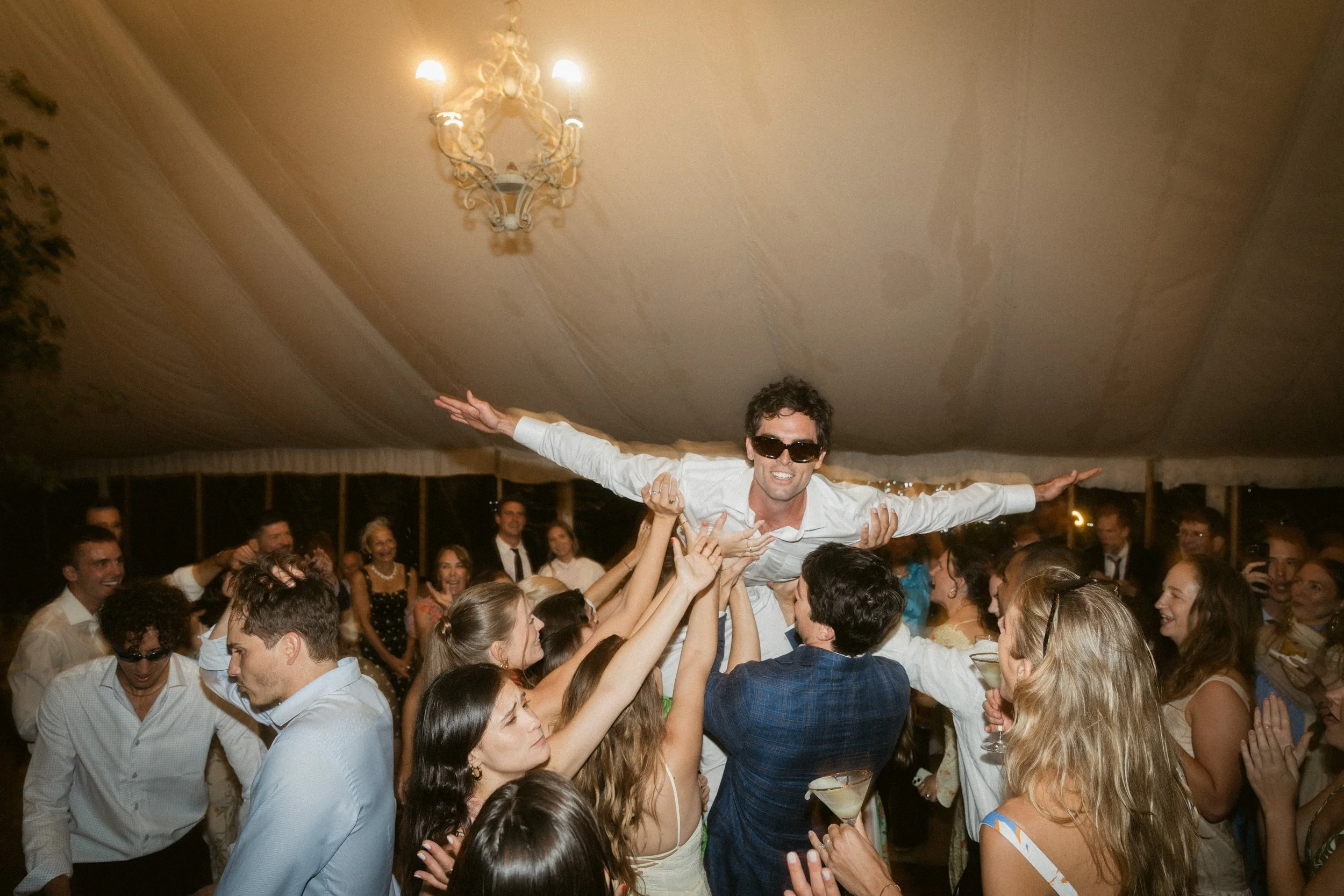crowd surfing at a wedding