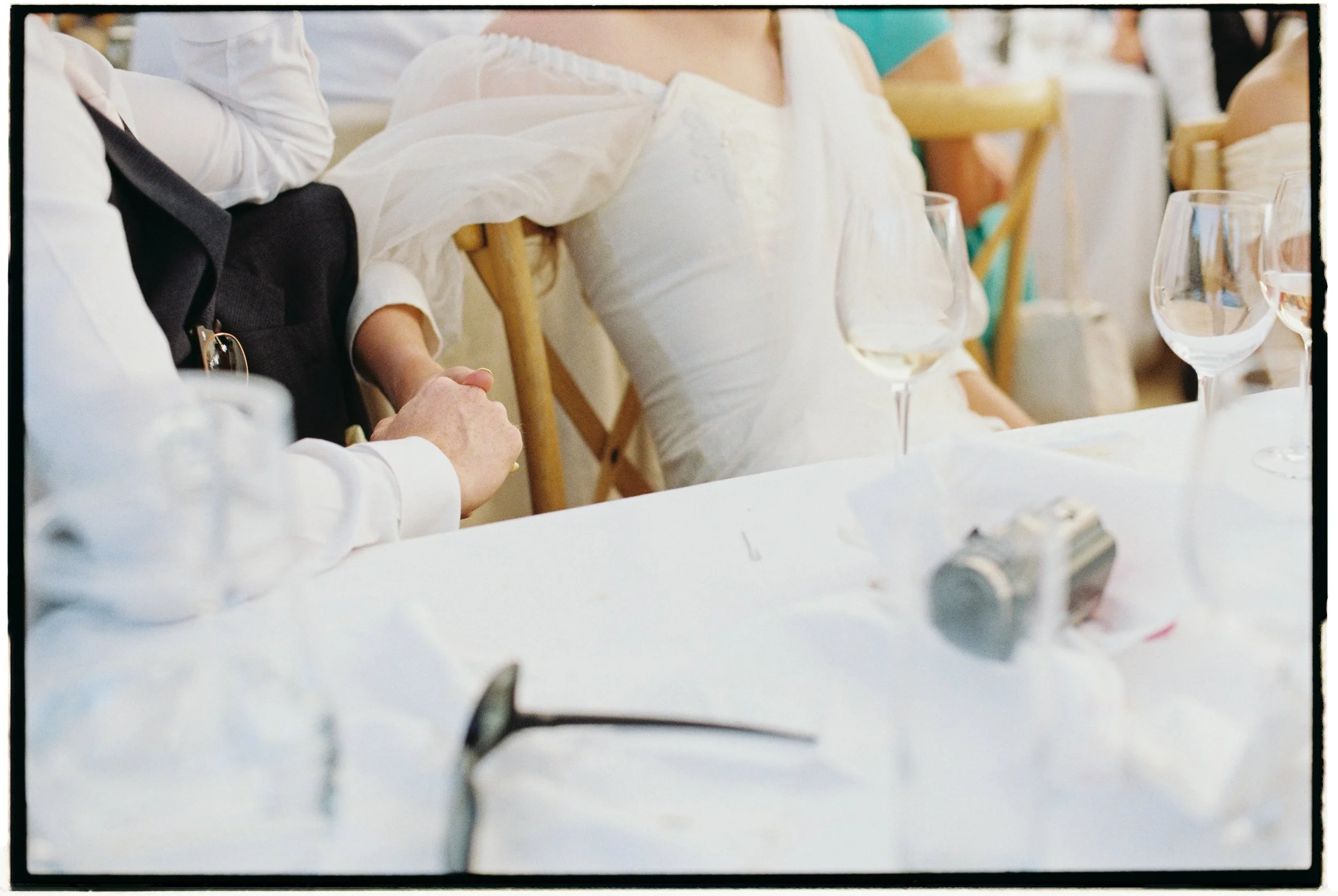 gorgeous candid analogue film photography at a cornish marquee wedding with cute little moments