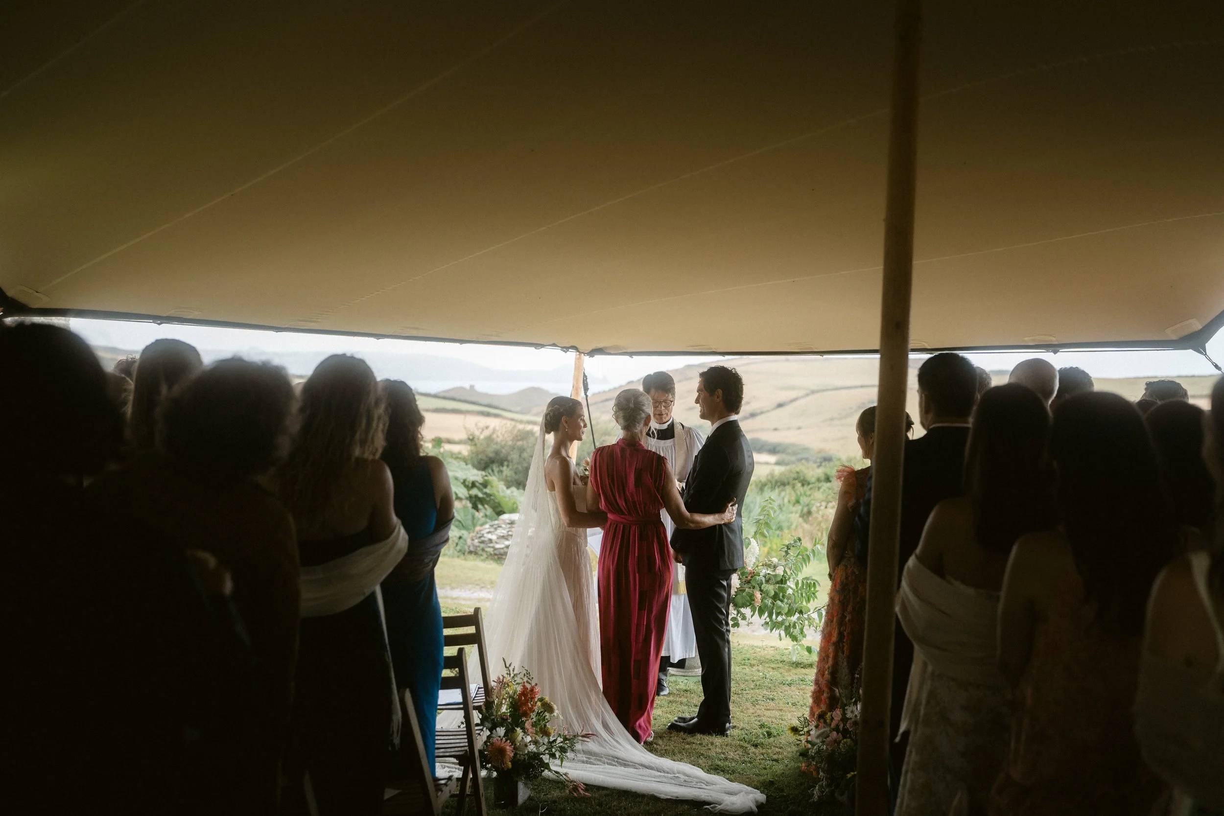 outdoor summer wedding in the rain at Roscarrock