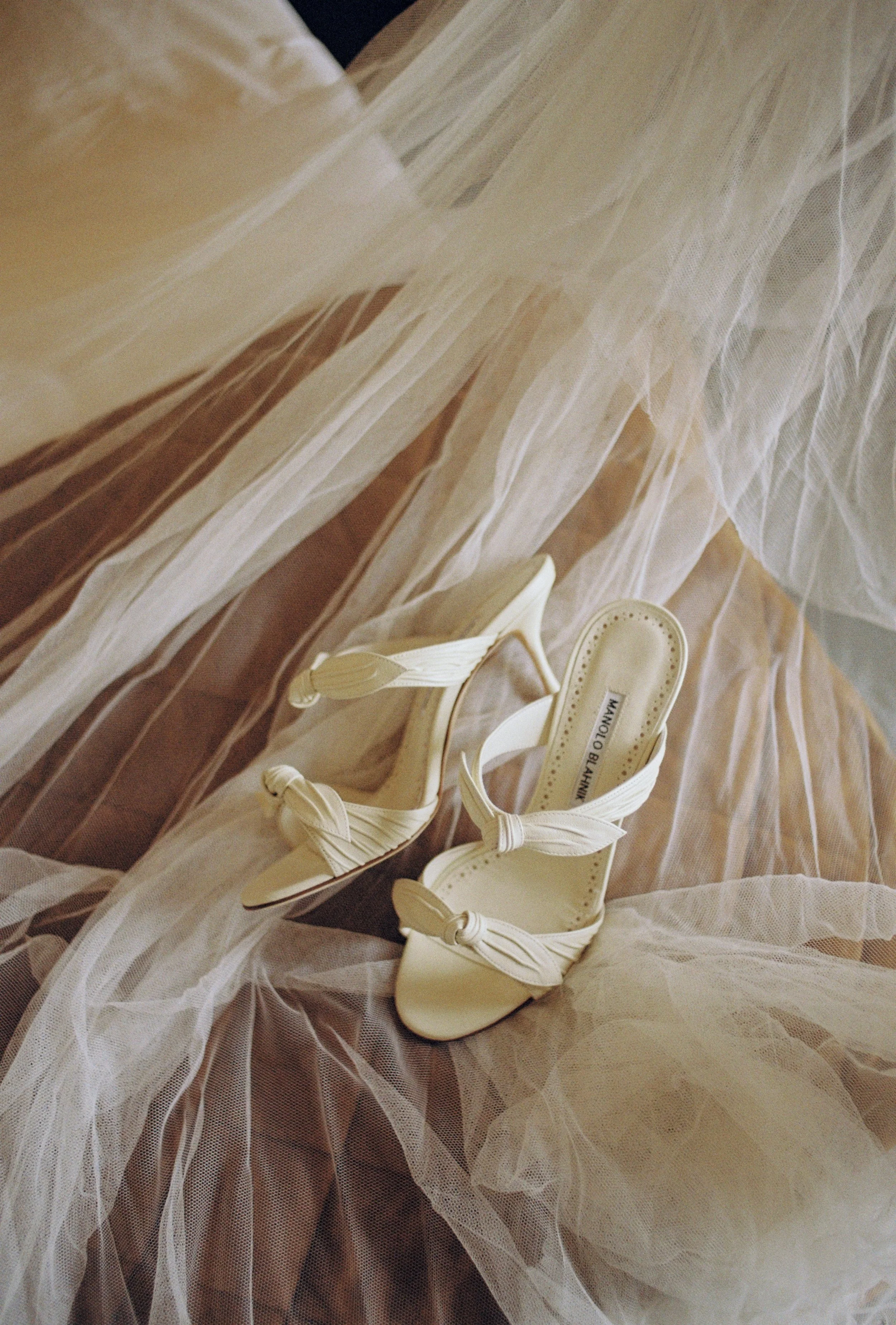 manolo blahnik designer bridal shoes captured on analogue film in cornwall