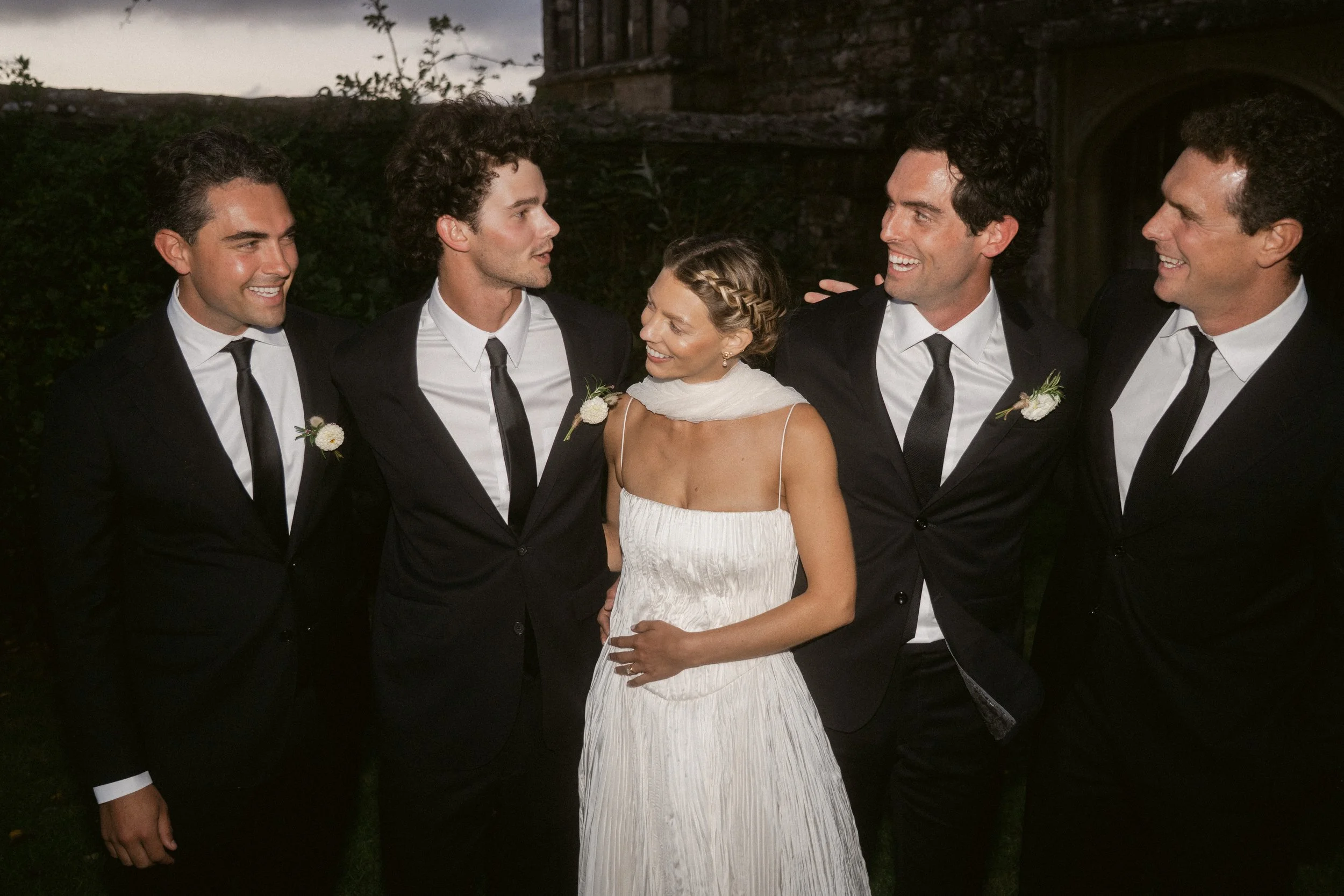 direct flash style editorial wedding photography with black tuxedos