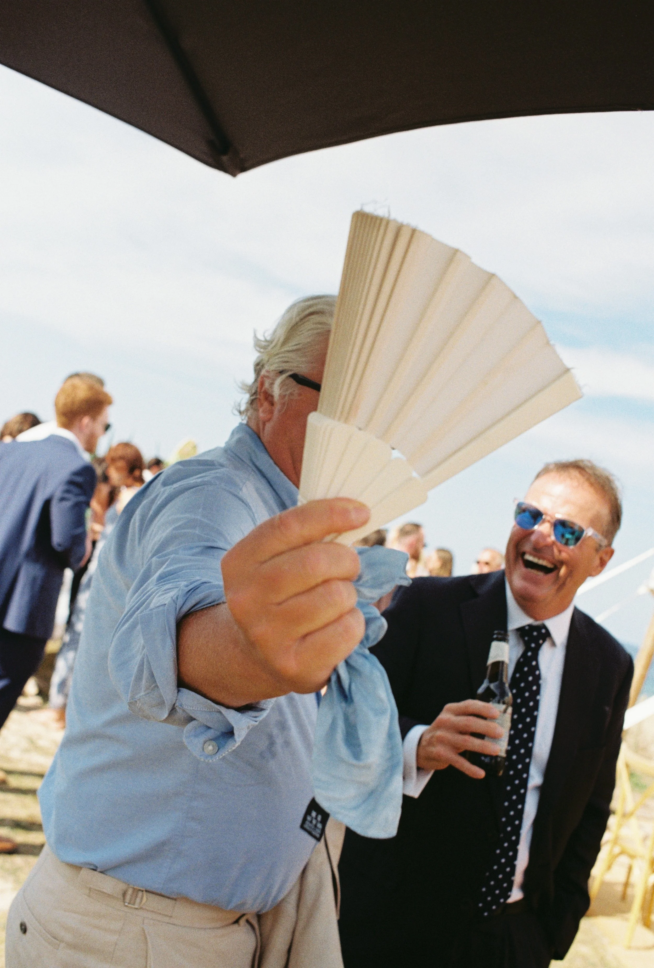 candid guest photography at relaxed seaside wedding