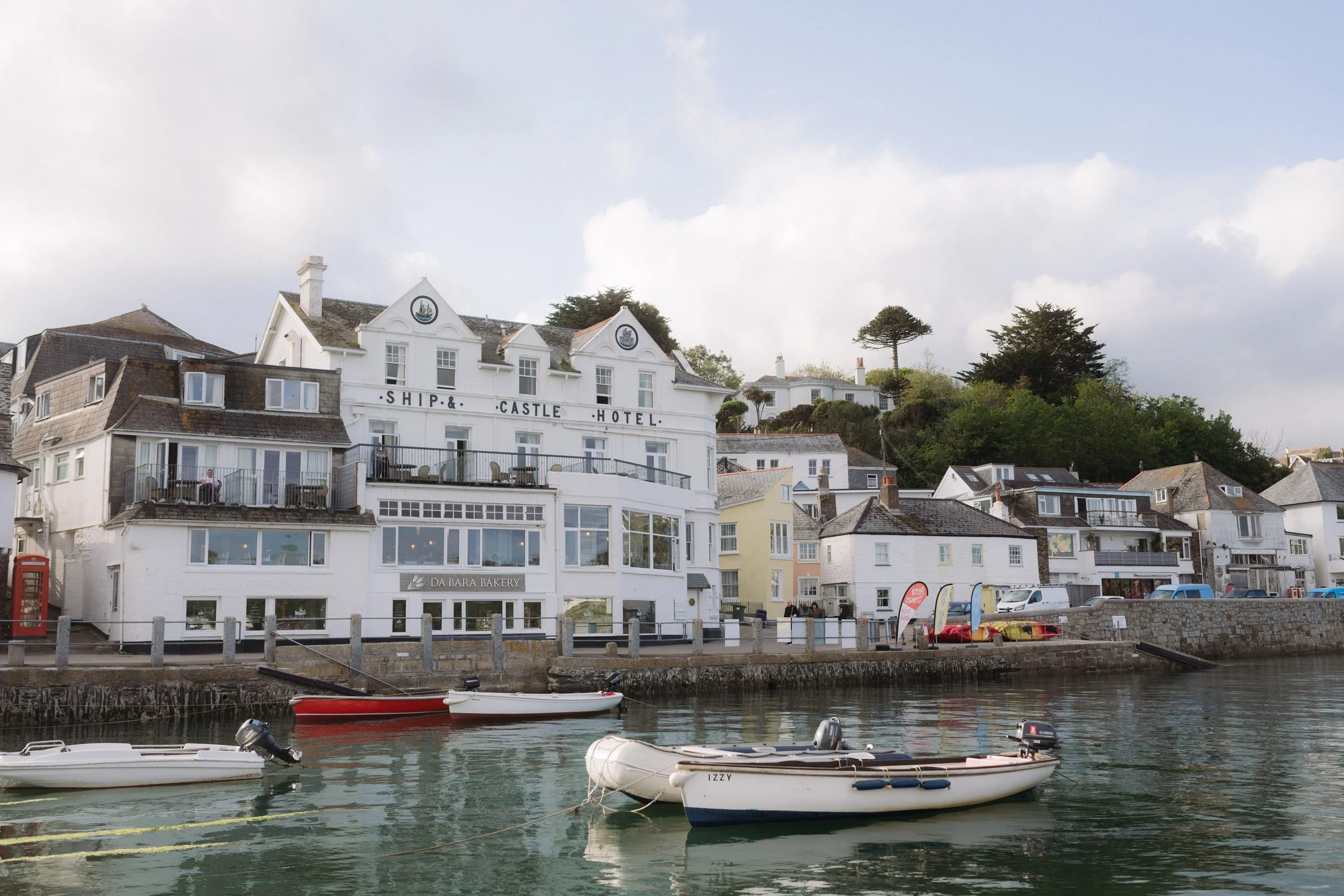 views of the idle rocks st mawes over the harbour during a boat wedding