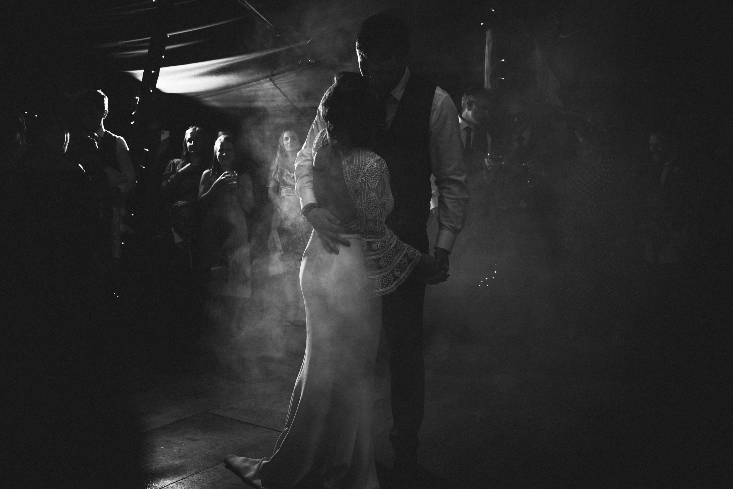 dramatic and candid first dance moments captured at a tipi wedding at Pengenna Manor in Cornwall