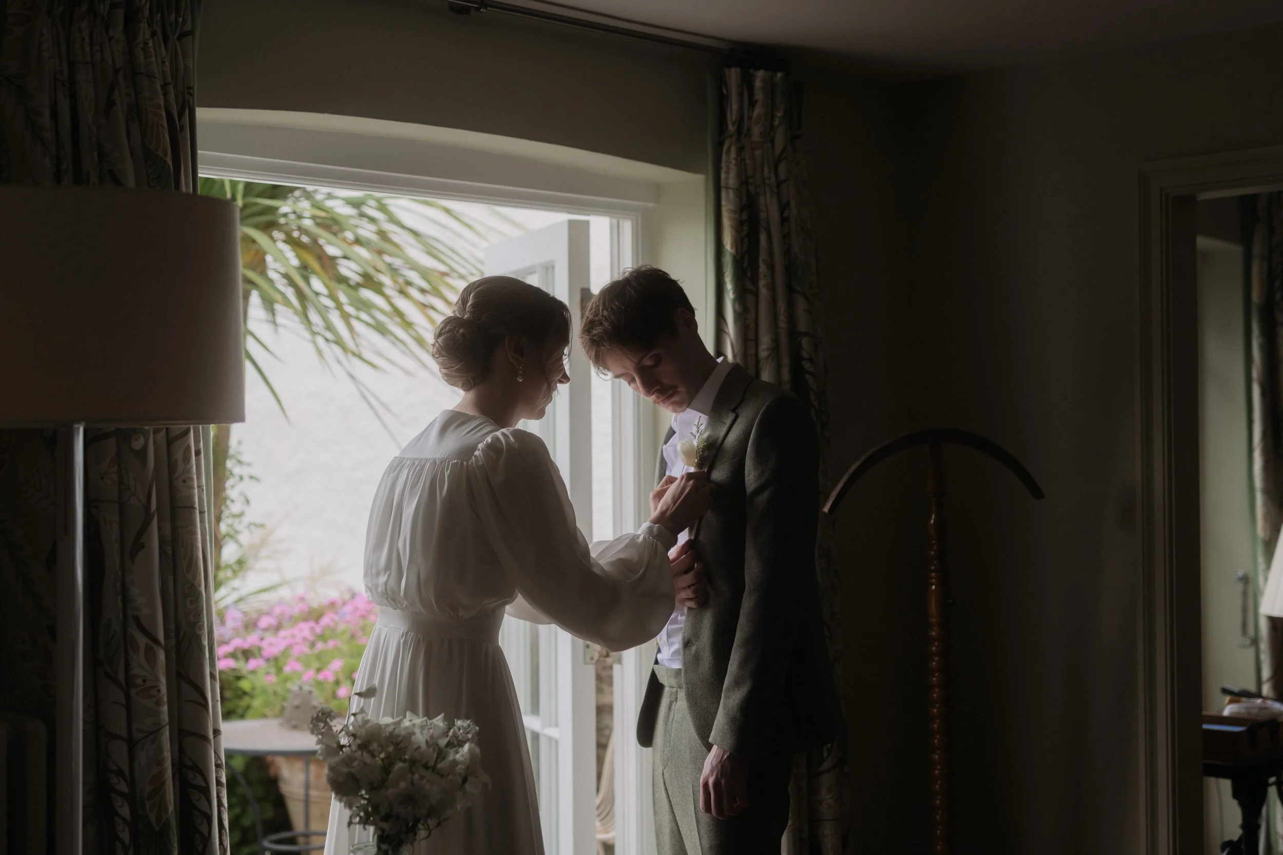 romantic natural editing true to colour cinematic wedding photography of a couple getting ready together before their elopement