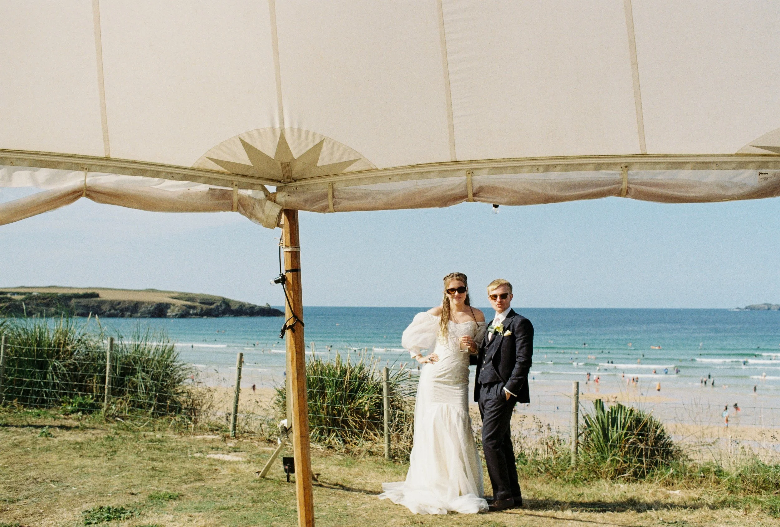 90's inspired Gen Z beach wedding in cornwall with vintage wedding dress