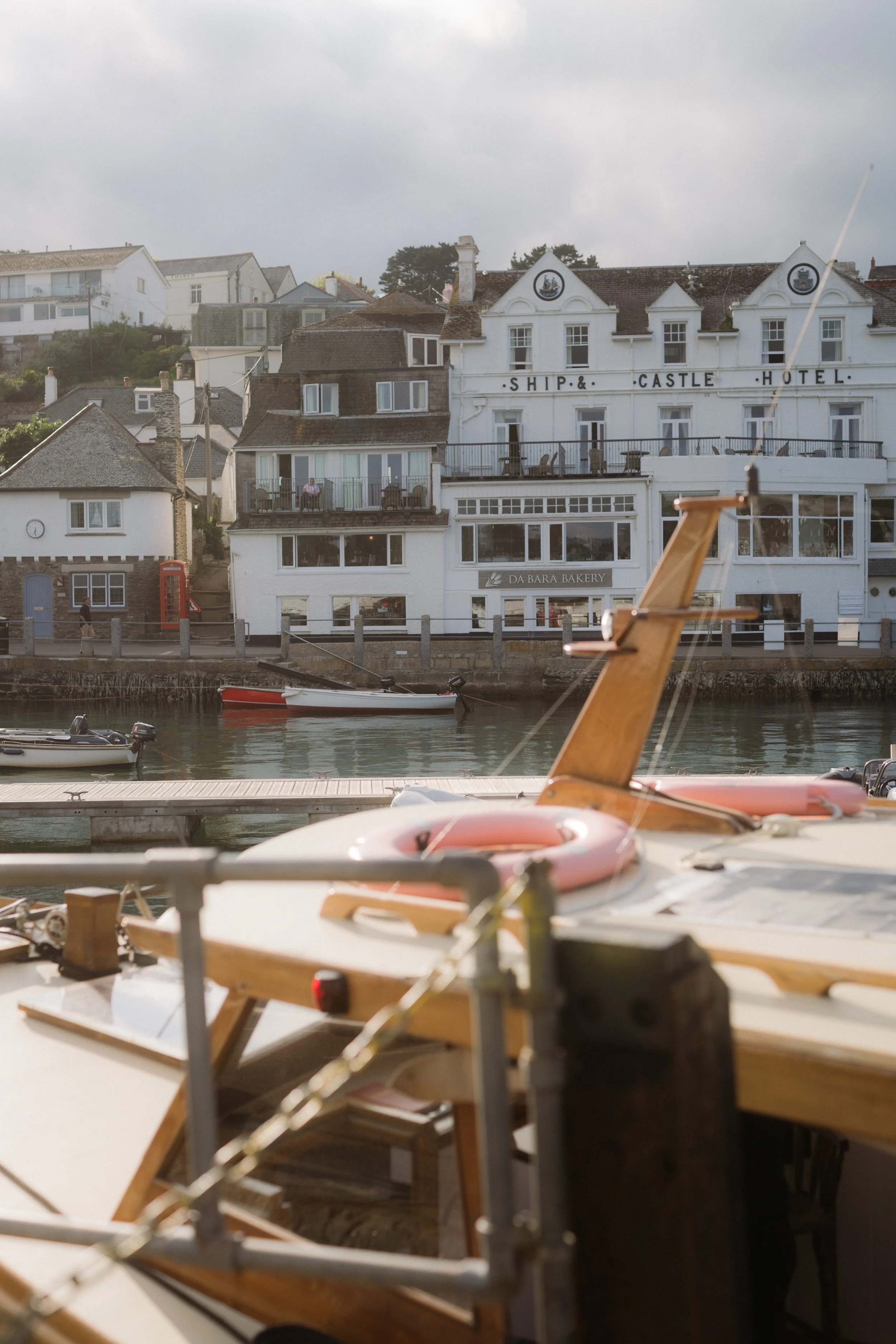 boats in the harbour on a sunny may day in st mawes